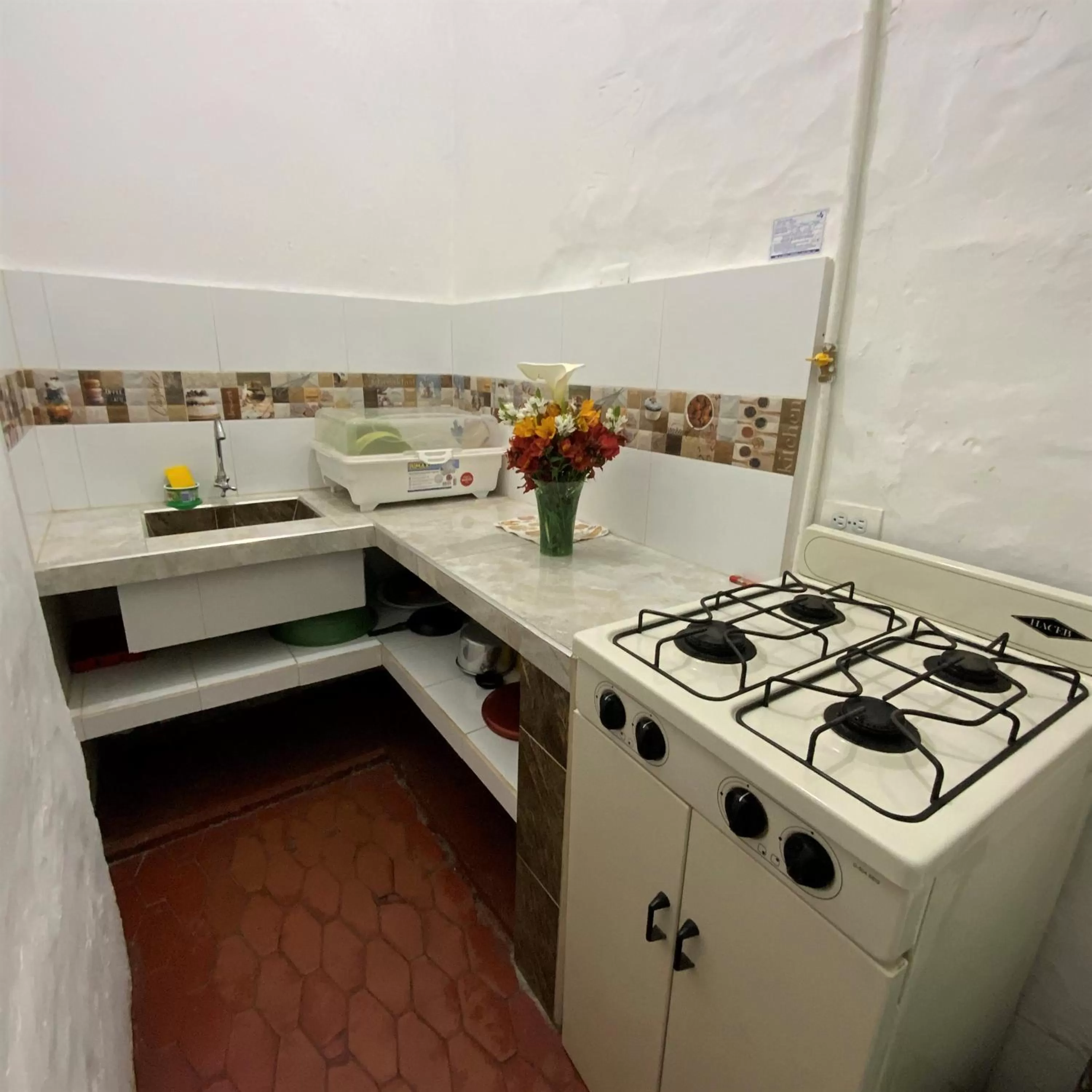 Kitchen/Kitchenette in Posada Turistica Nakku