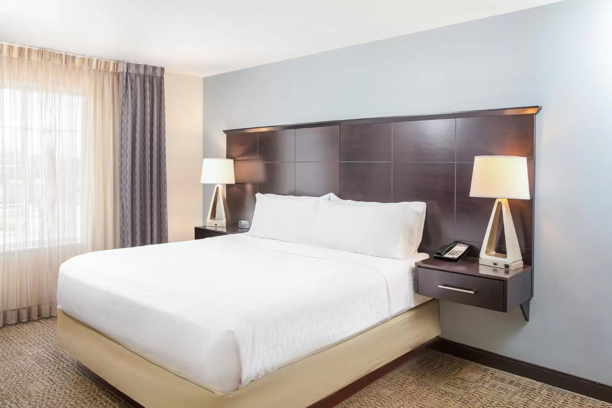 Photo of the whole room, Bed in Staybridge Suites Denver - Central Park, an IHG Hotel