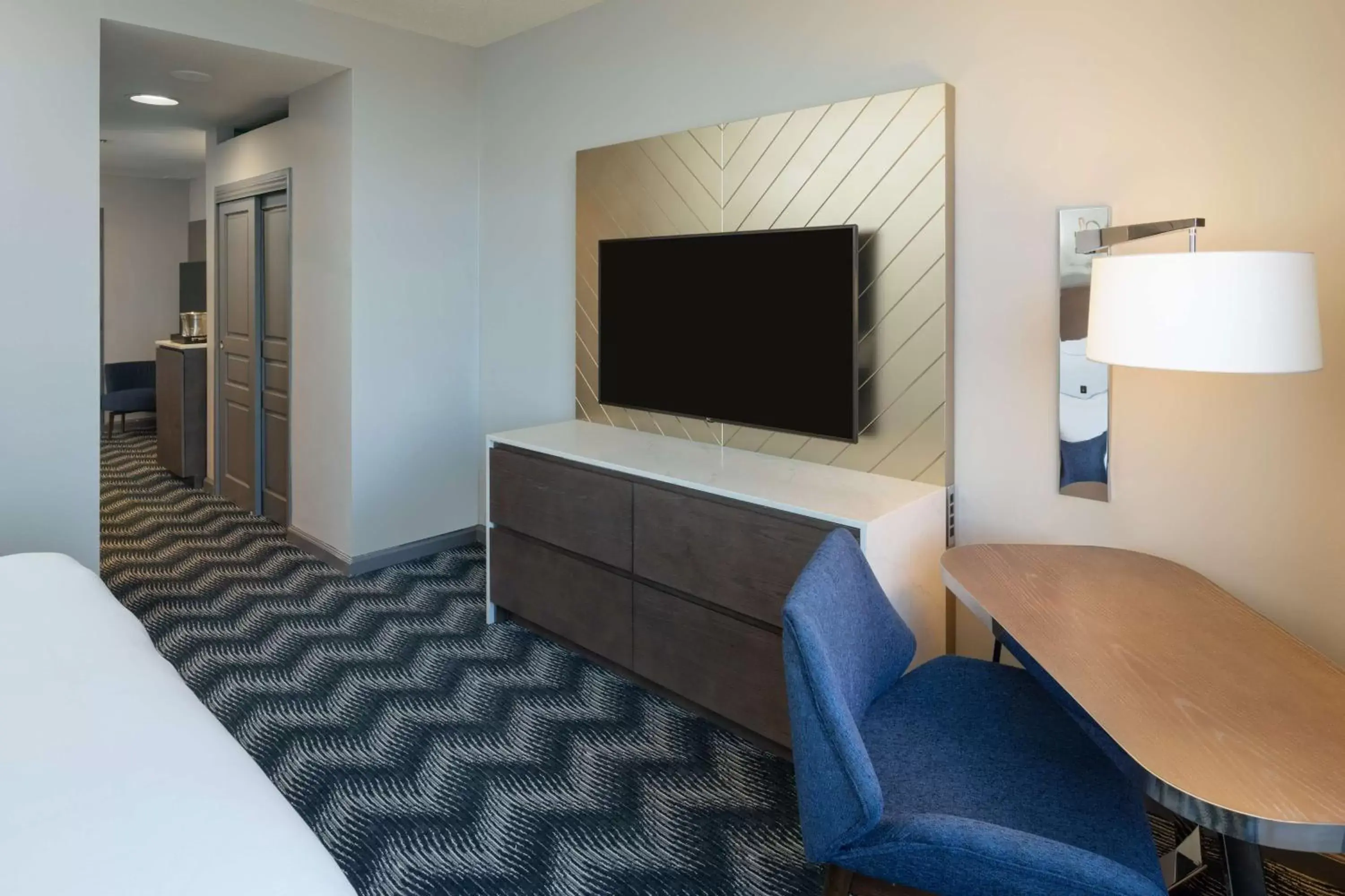 Bedroom, TV/Entertainment Center in Hilton Houston North