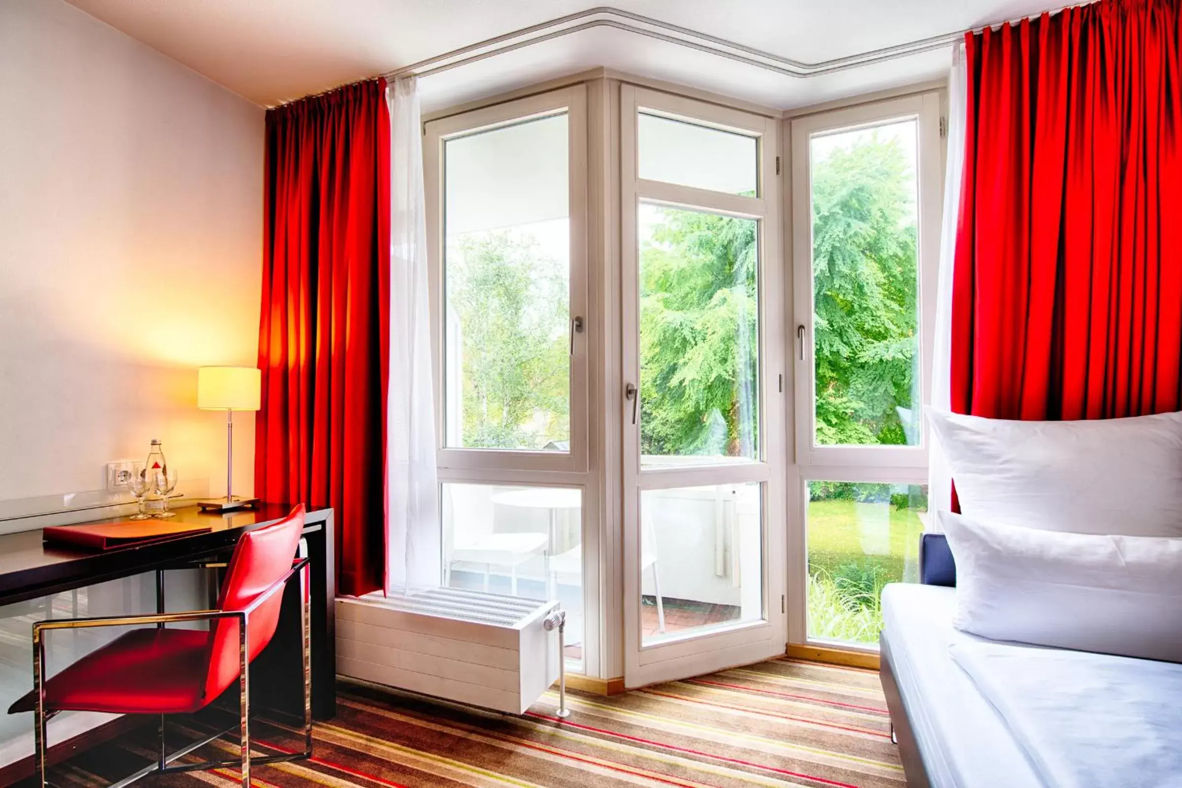 Bedroom in Leonardo Hotel München City West