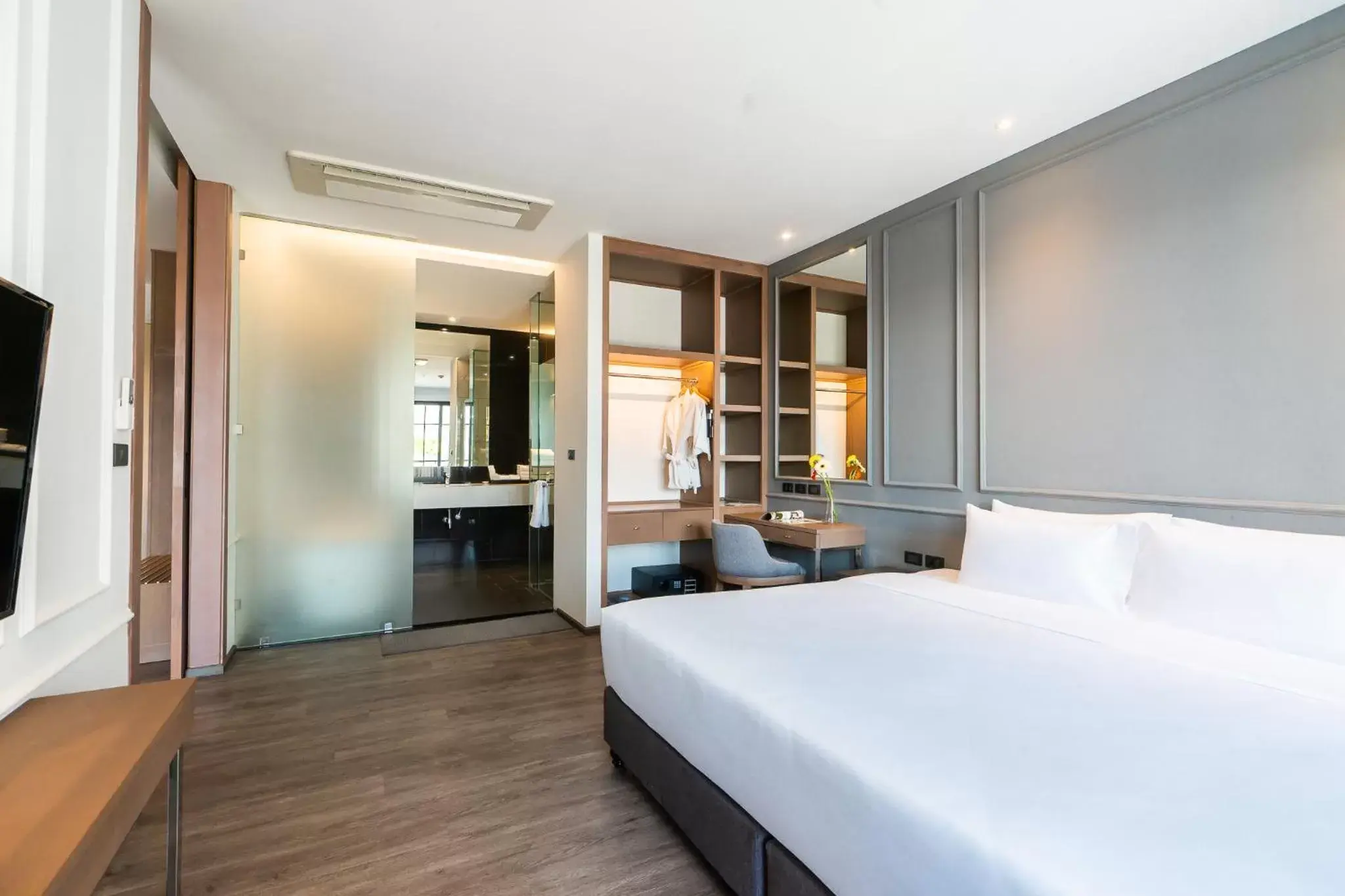 wardrobe, Bed in One Patio Hotel Pattaya - SHA Extra Plus