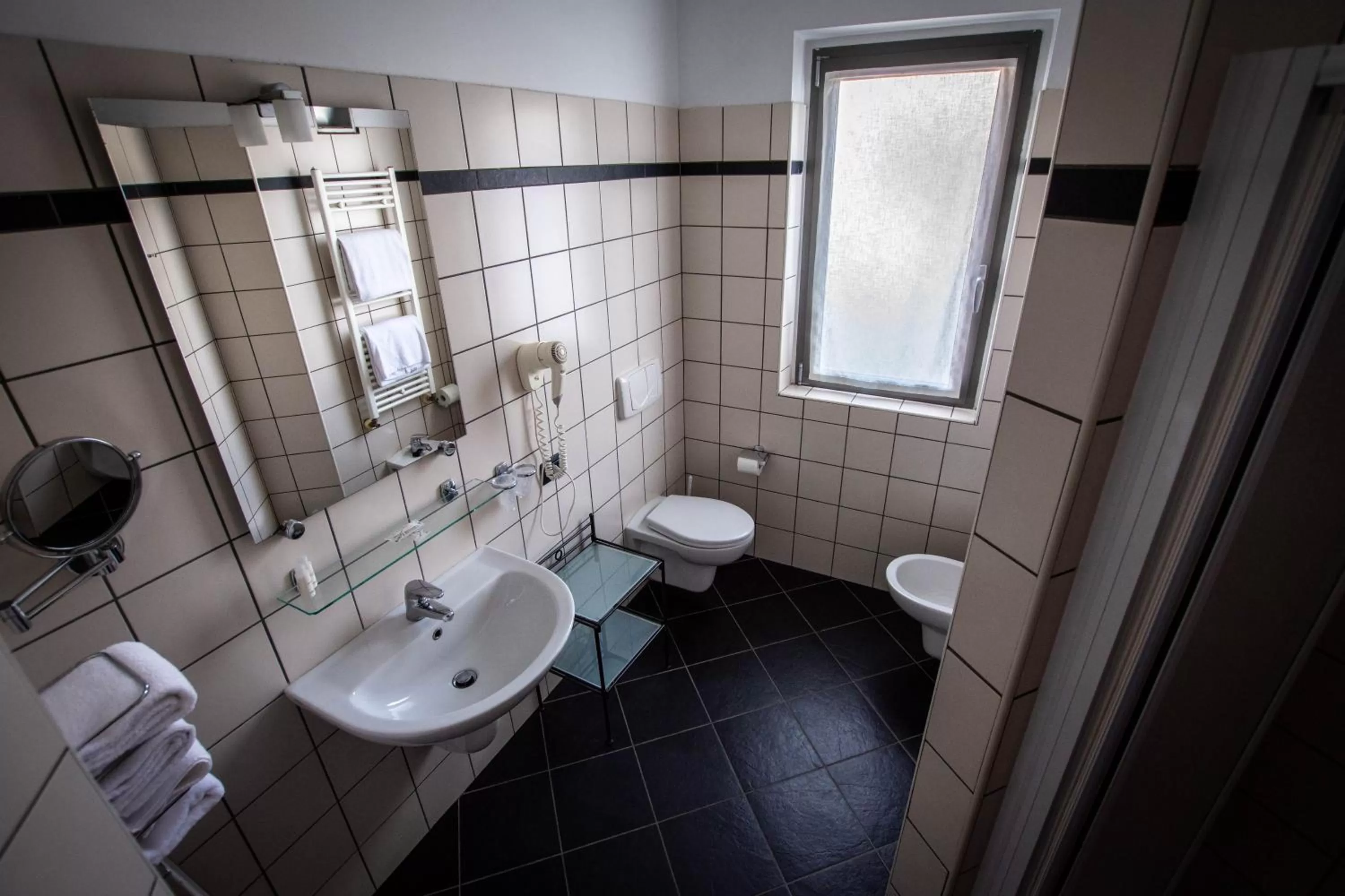 Bathroom in AgriCamping AlbaVillage Hotel & Wellness