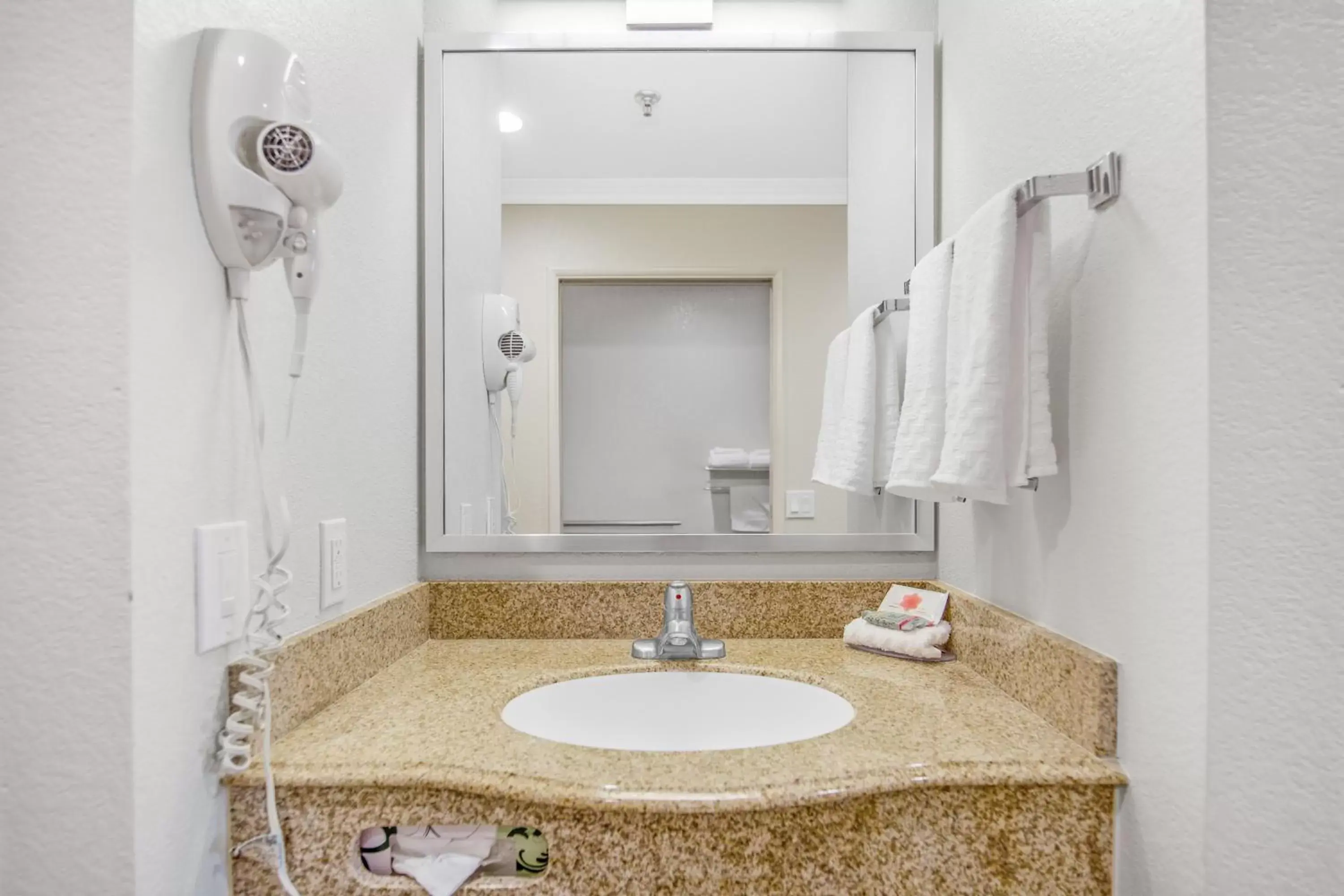 Bathroom in SureStay Hotel by Best Western Fontana