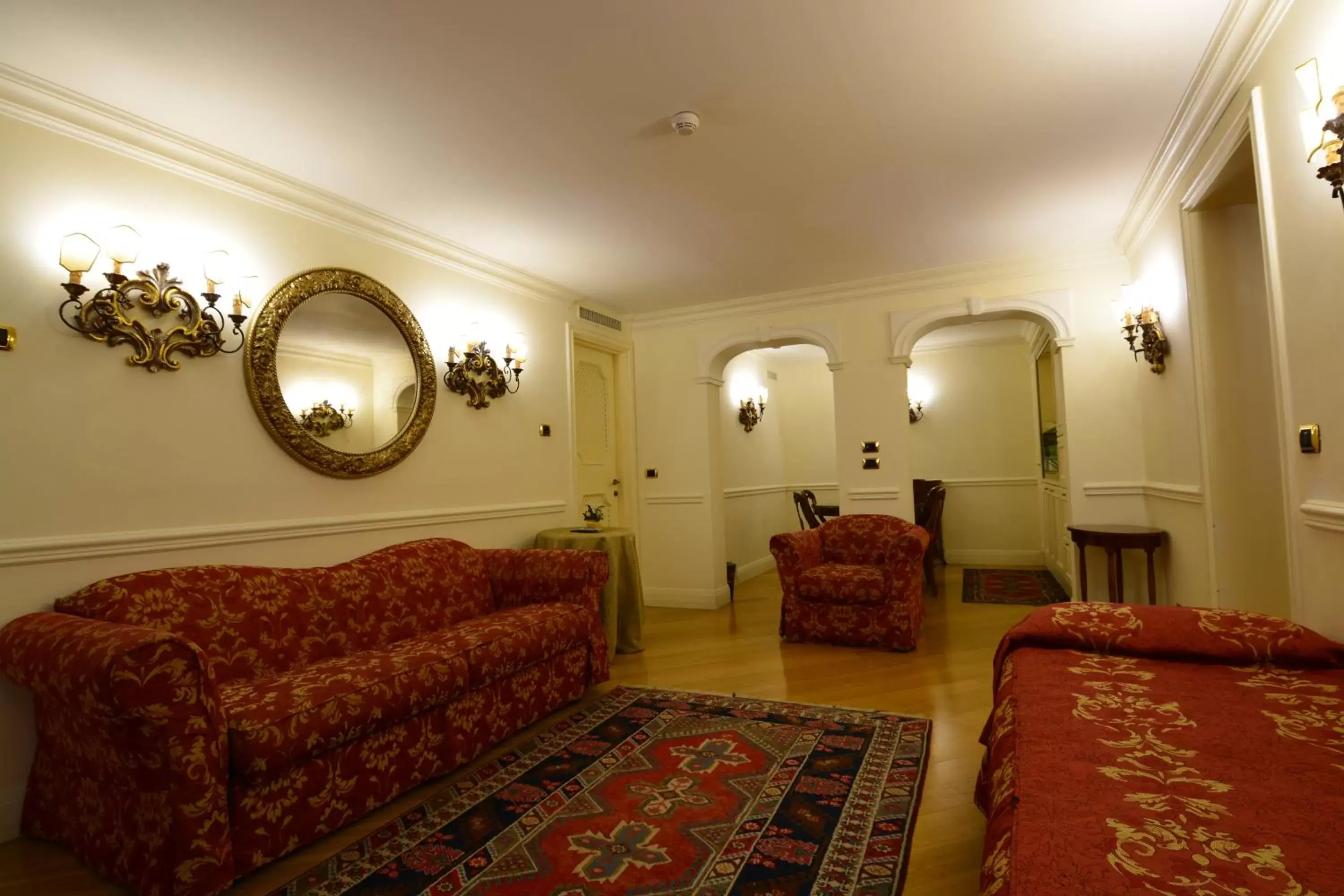 Bed, Seating Area in Royal San Marco Hotel