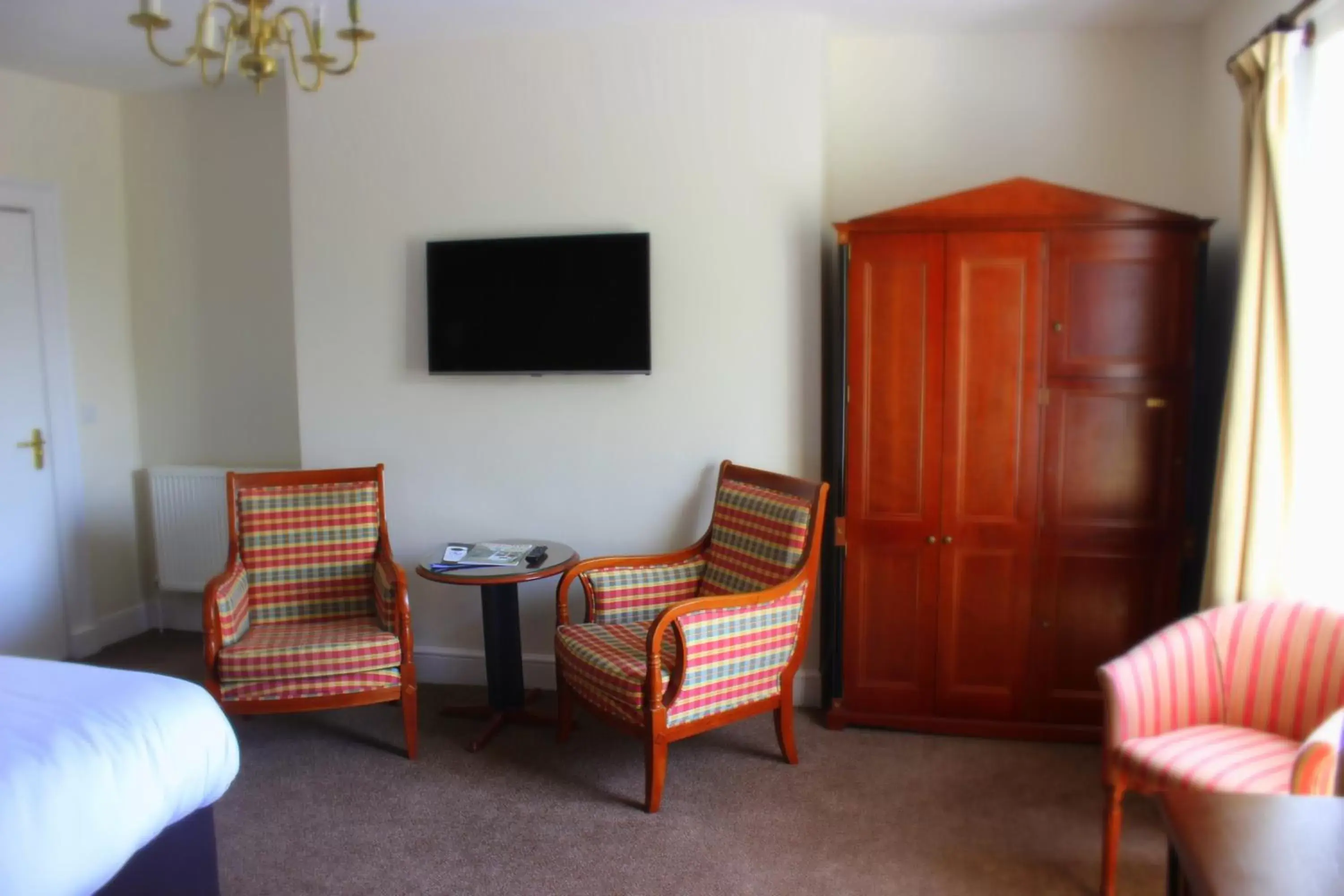 Bedroom, Seating Area in The Frocester