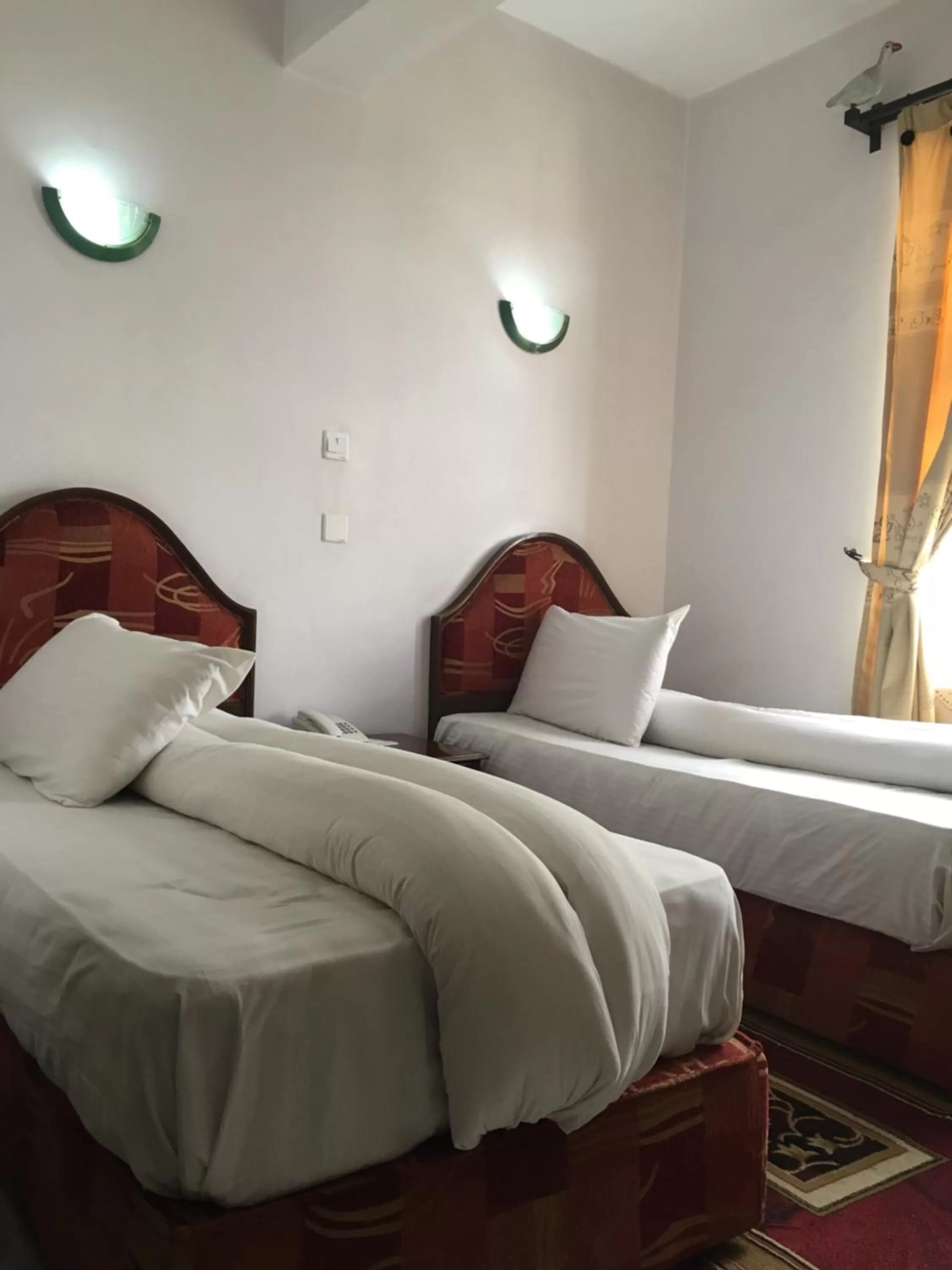 Bed in Natron Palace Hotel