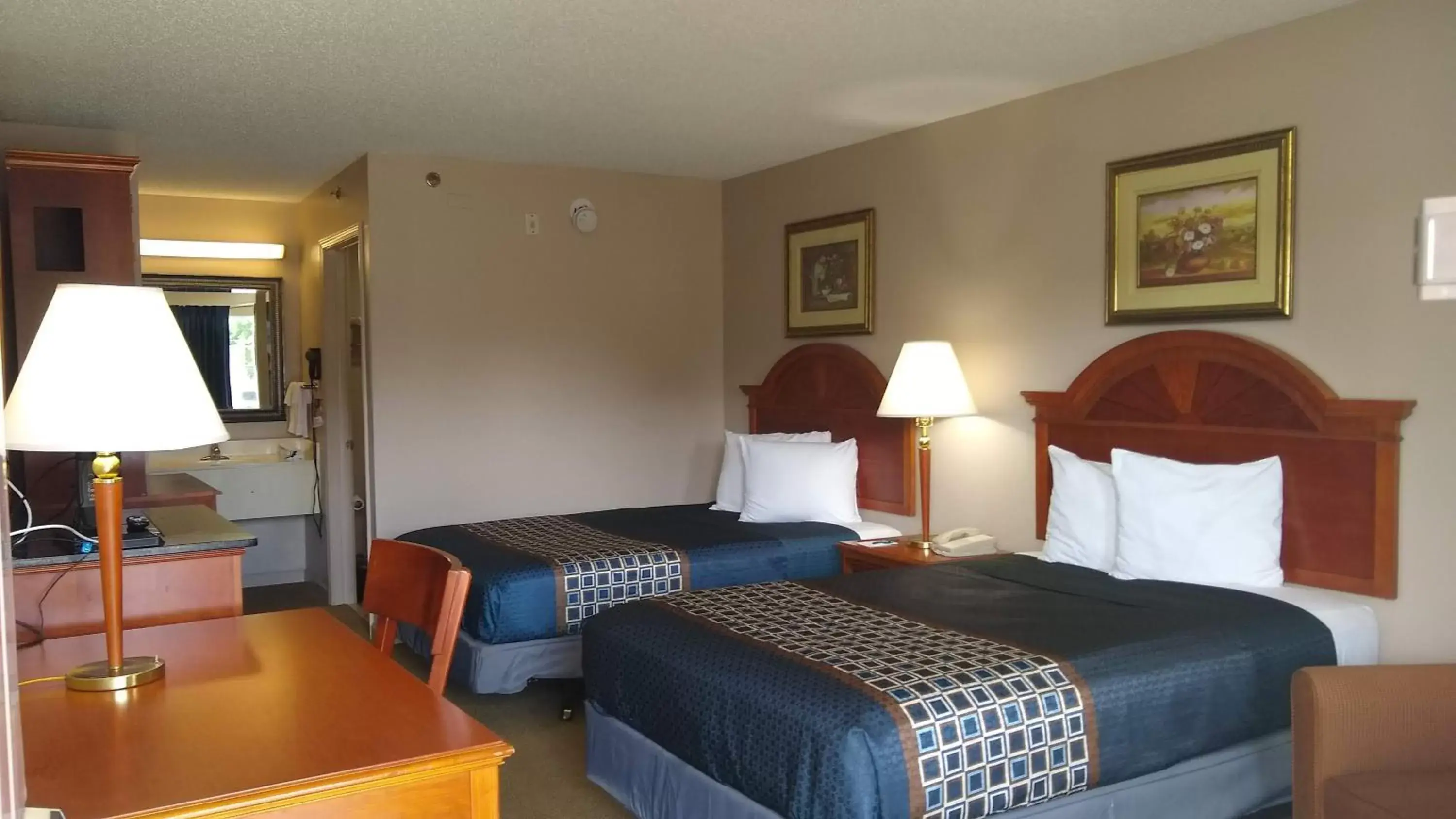 Bedroom, Bed in Carom Inn a Travelodge by Wyndham Denham Springs-Baton Rouge