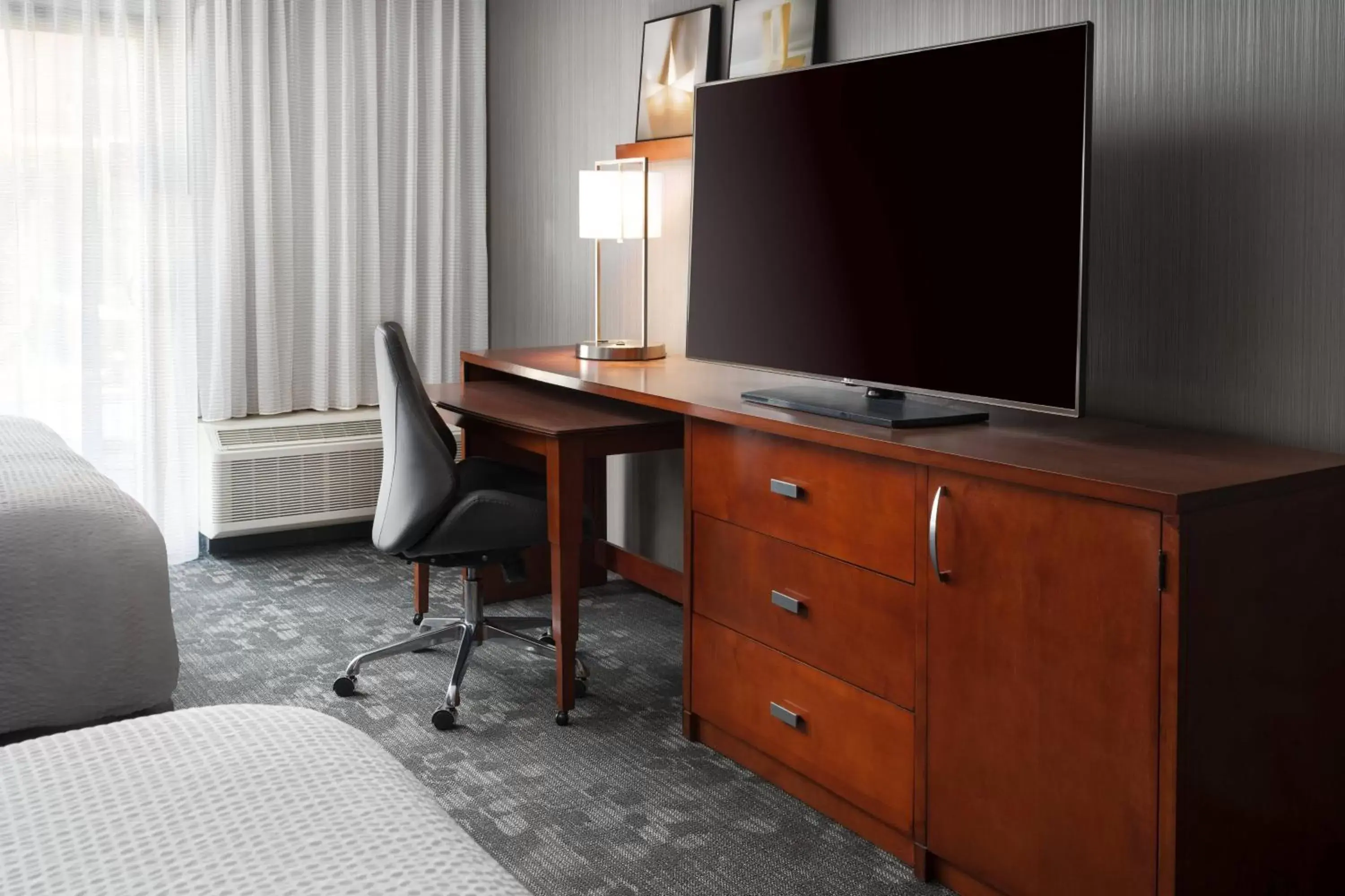 Photo of the whole room, TV/Entertainment Center in Courtyard by Marriott Phoenix Mesa