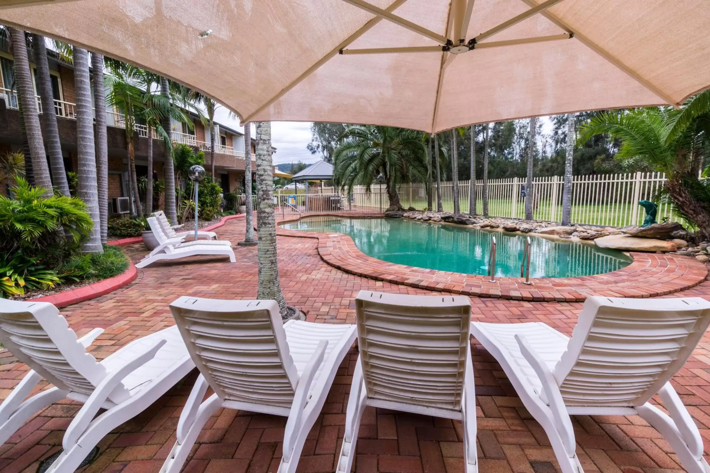 Swimming pool, Patio/Outdoor Area in The Galaxy Motel