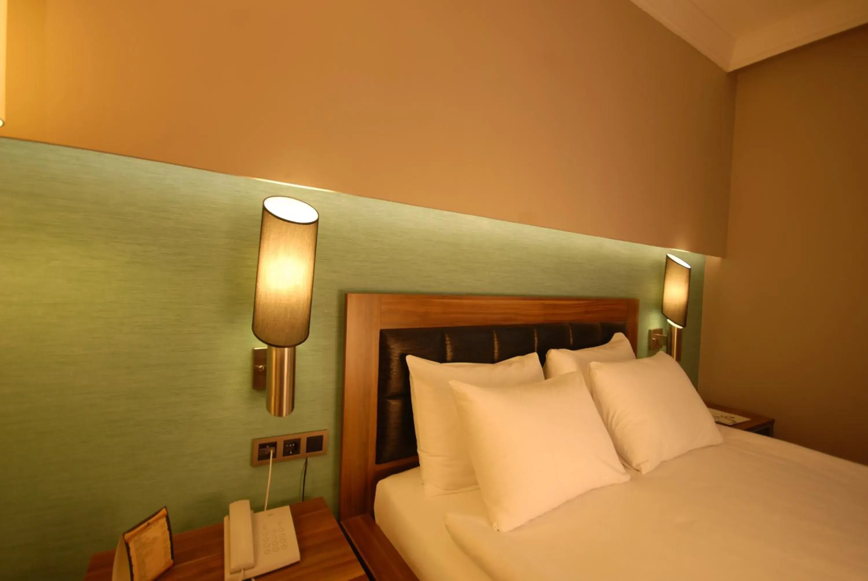 Bed in Suhan Cappadocia Hotel & Spa