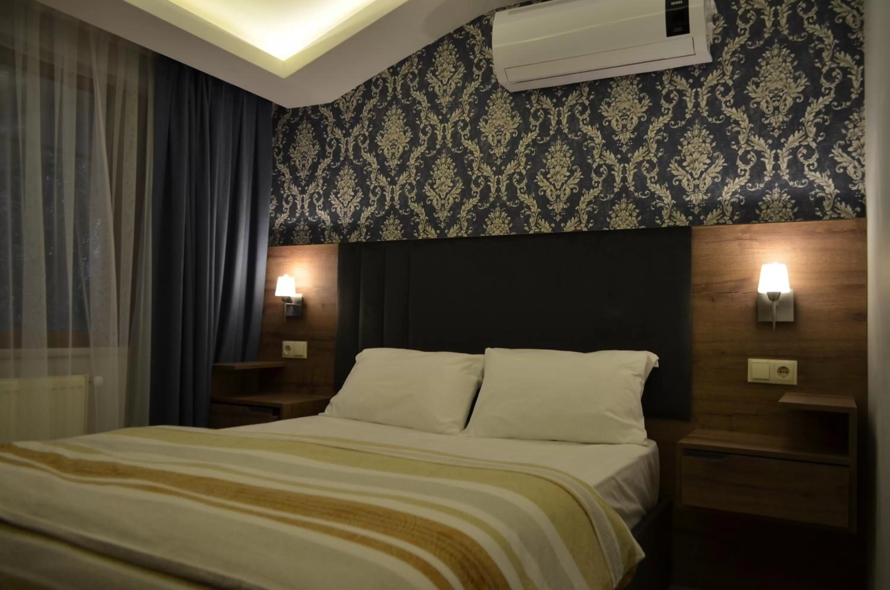 Bed in Yılmaz Suit Apartments