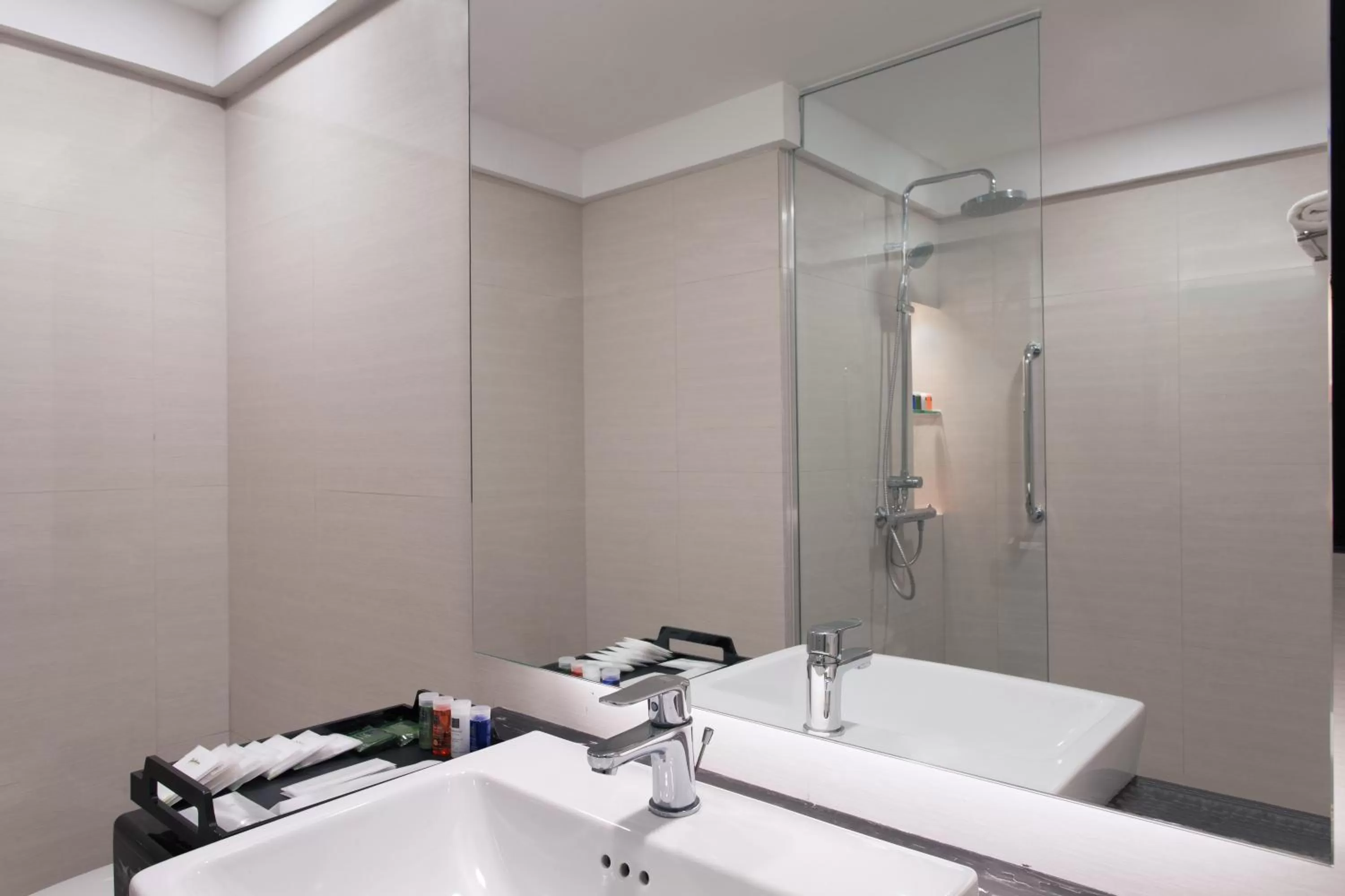 Bathroom in AIHO Hotel Medan