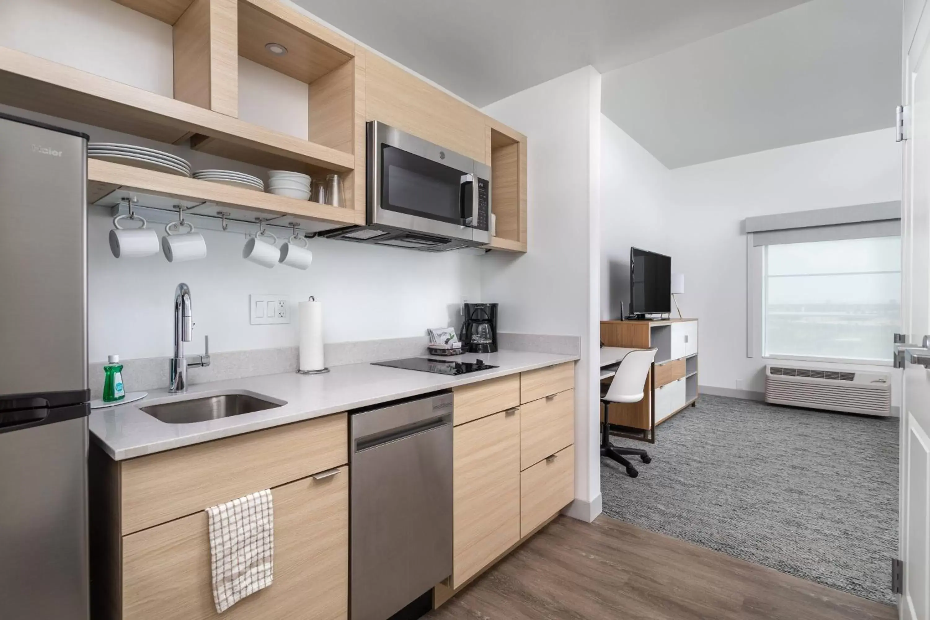 Bedroom, Kitchen/Kitchenette in TownePlace Suites By Marriott Orlando Southwest Near Universal