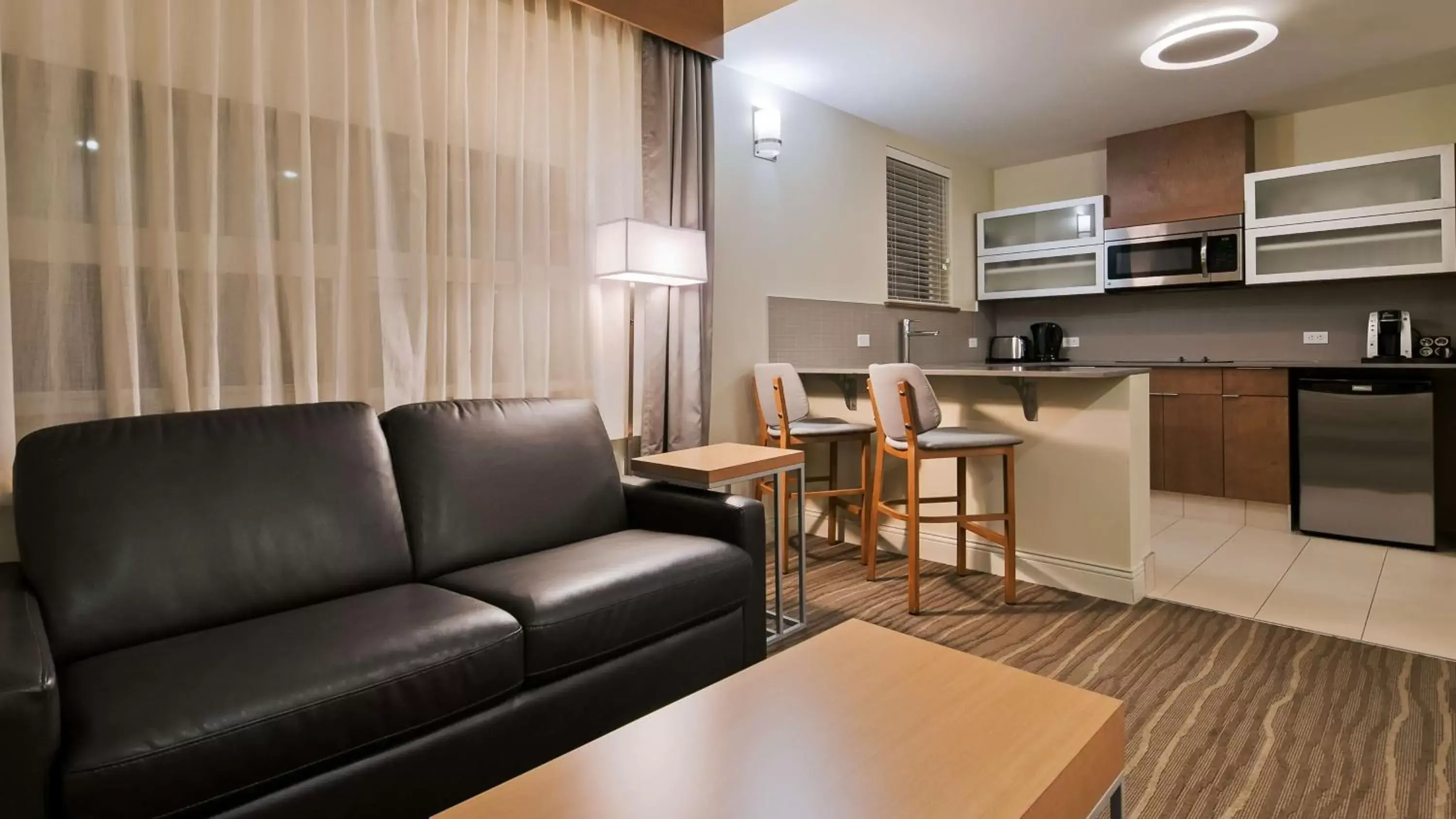 Photo of the whole room, Seating Area in Best Western Plus Sawridge Suites