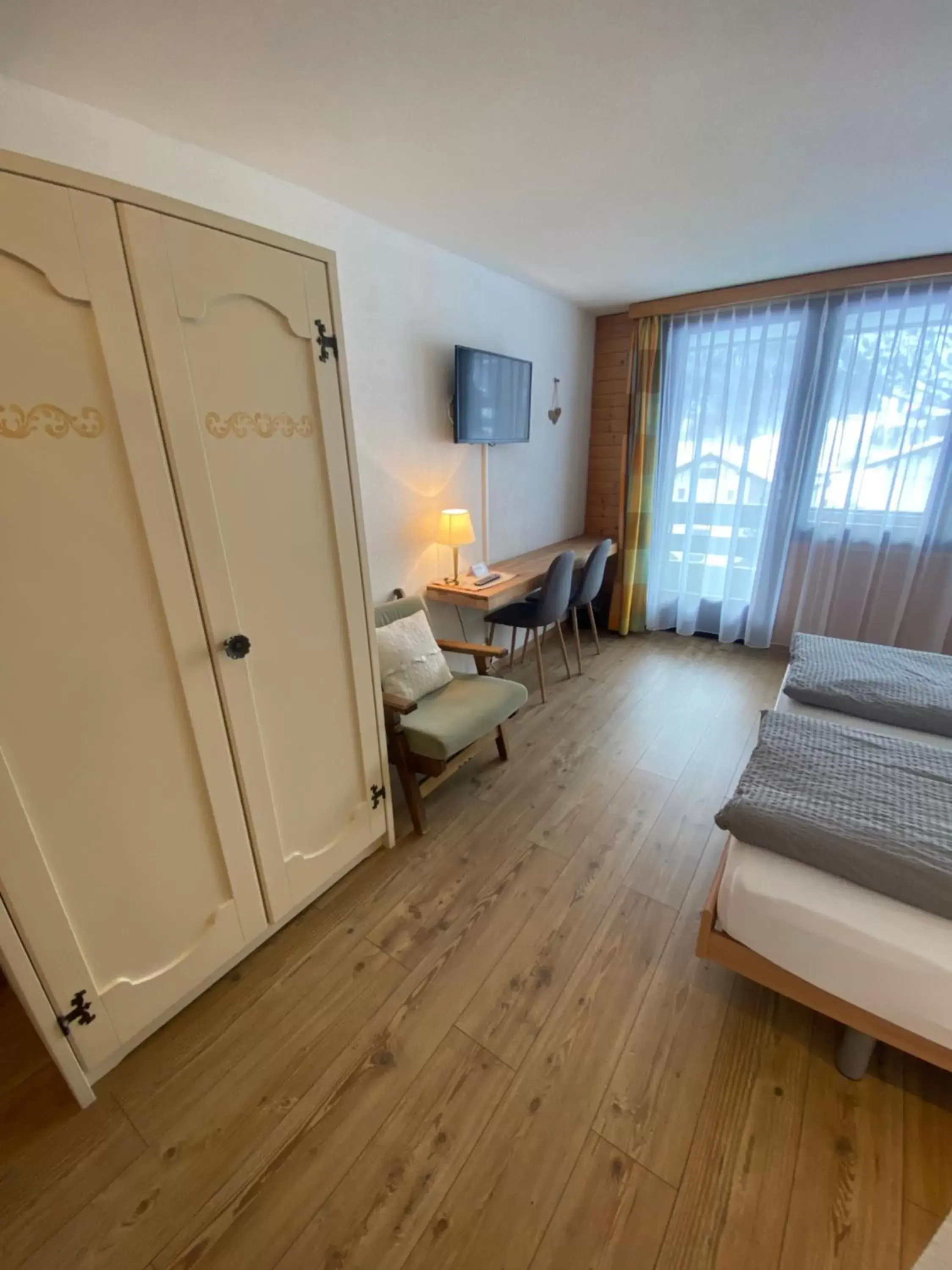 Bed, Seating Area in Hotel Garni Jägerhof