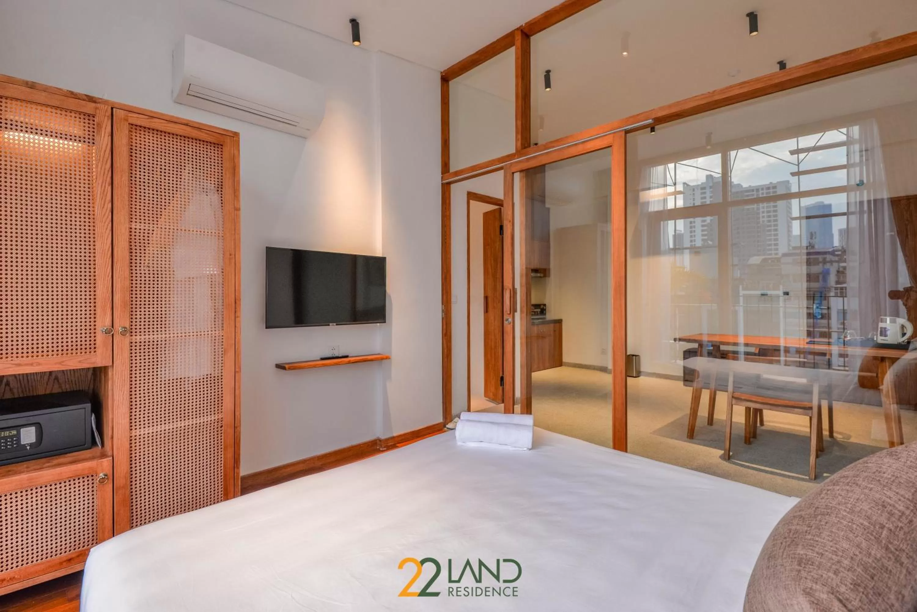 Communal lounge/ TV room, Bed in 22Land Hotel & Residence