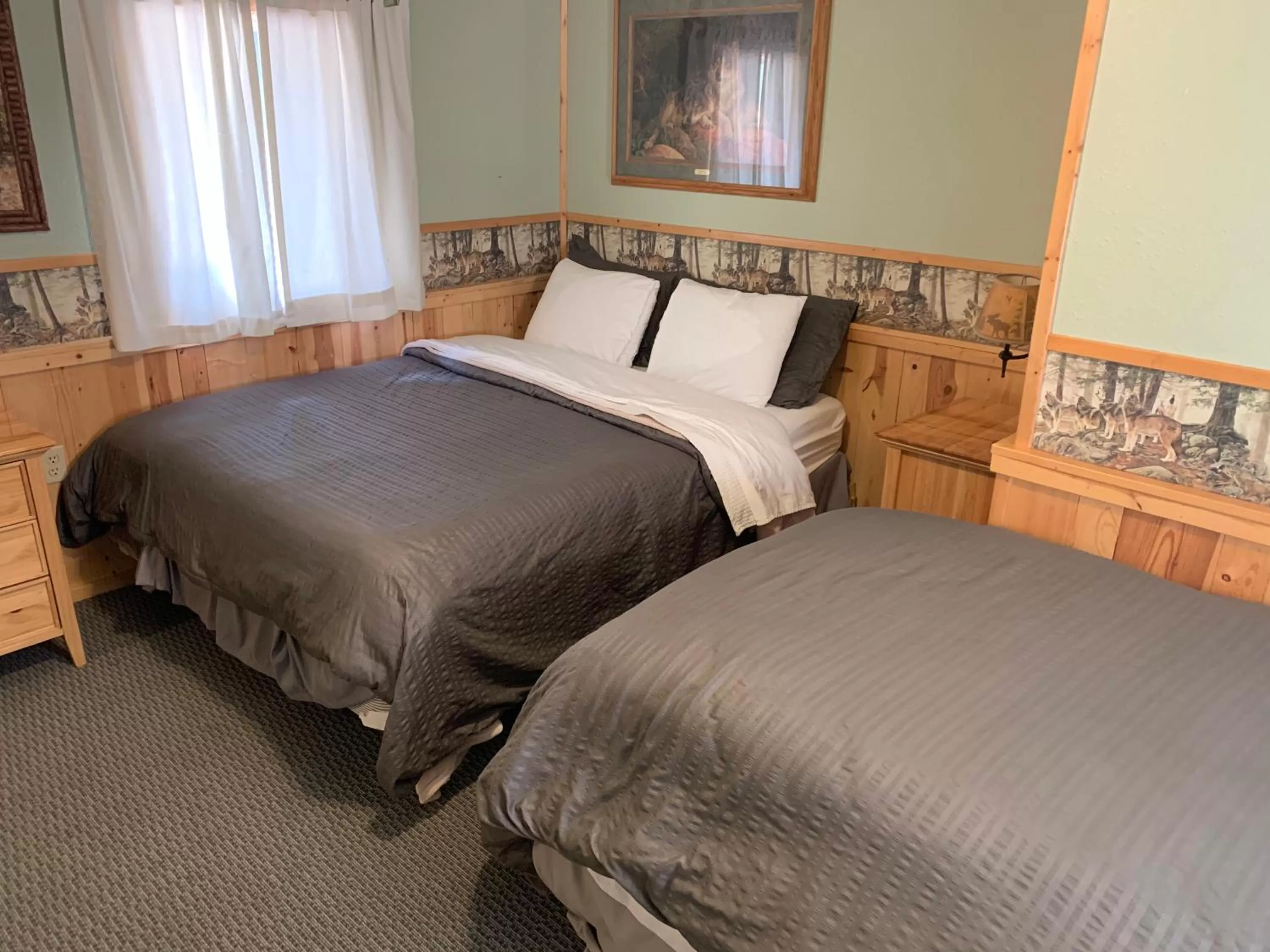 Bed in Glacier Haven Inn