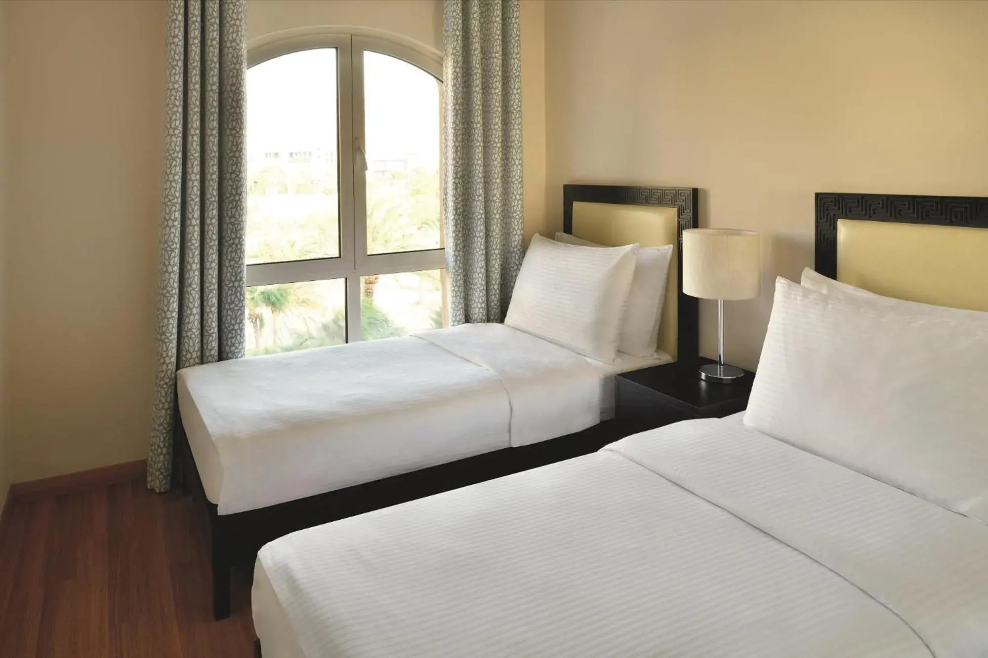 Property building, Bed in Mövenpick Resort & Residences Aqaba Property building, Bed in Mövenpick Resort & Residences Aqaba