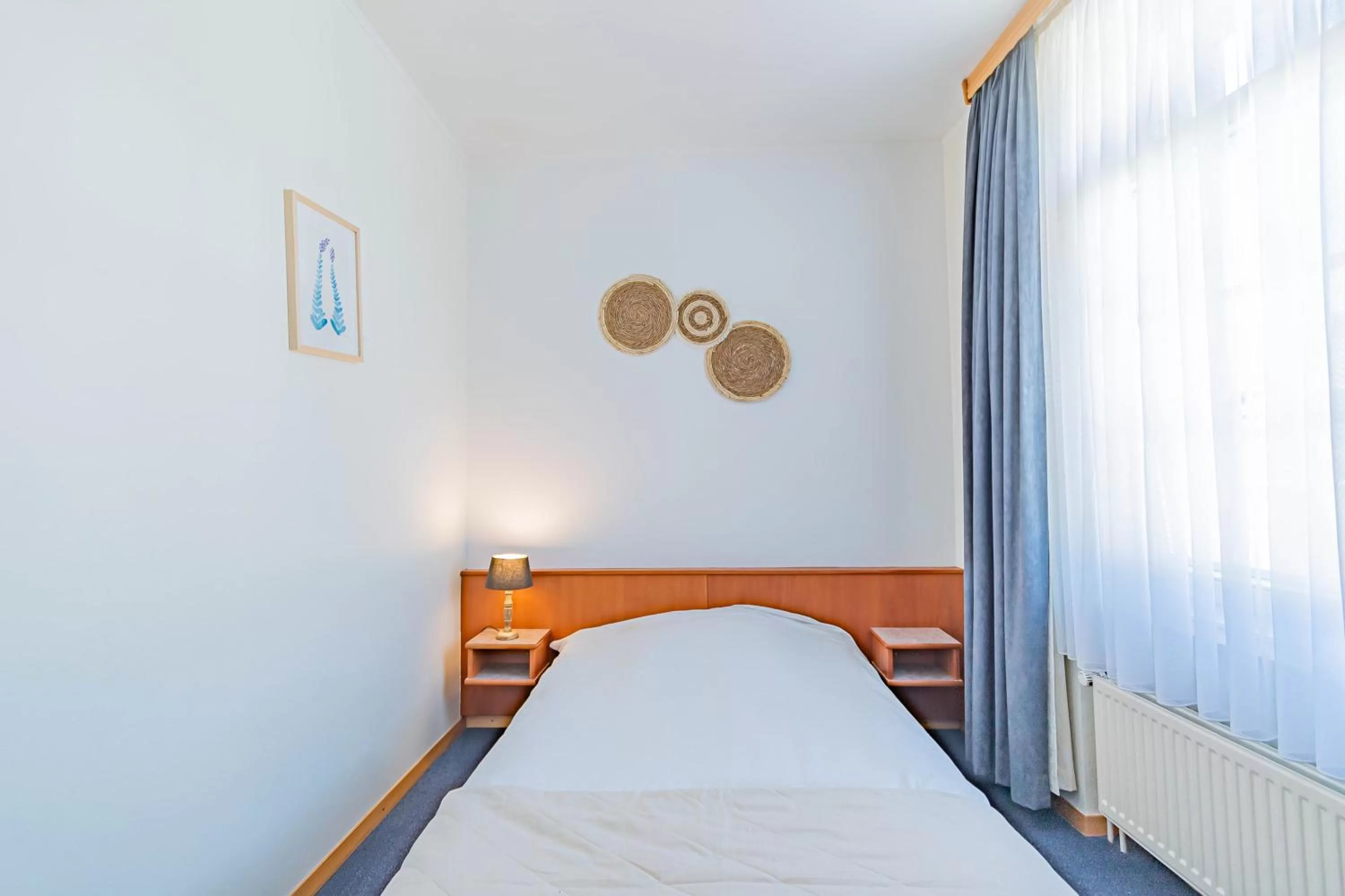 Bed in Hôtel Le Petit Poète