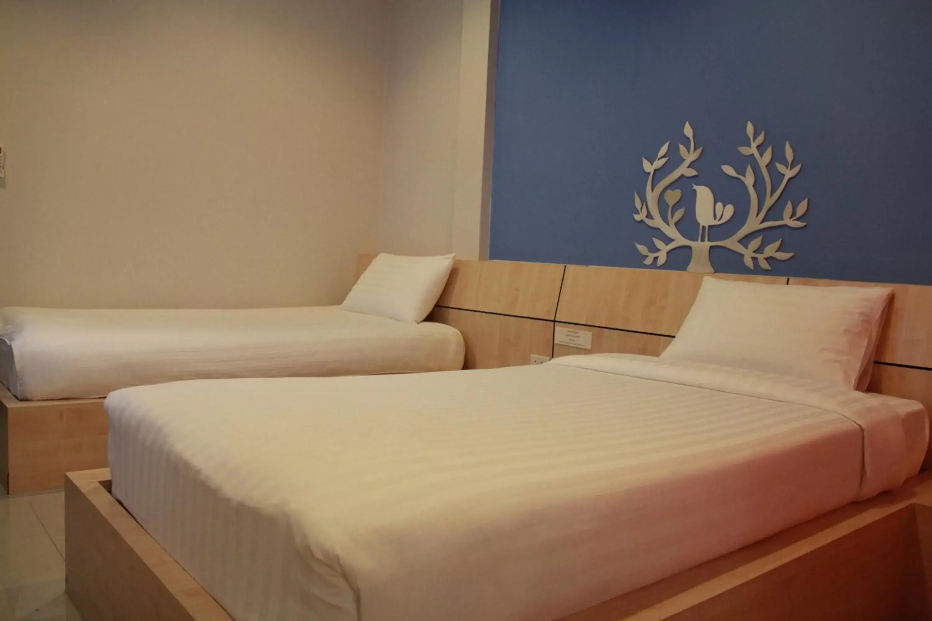 Bed in Le Lerts Living Hotel