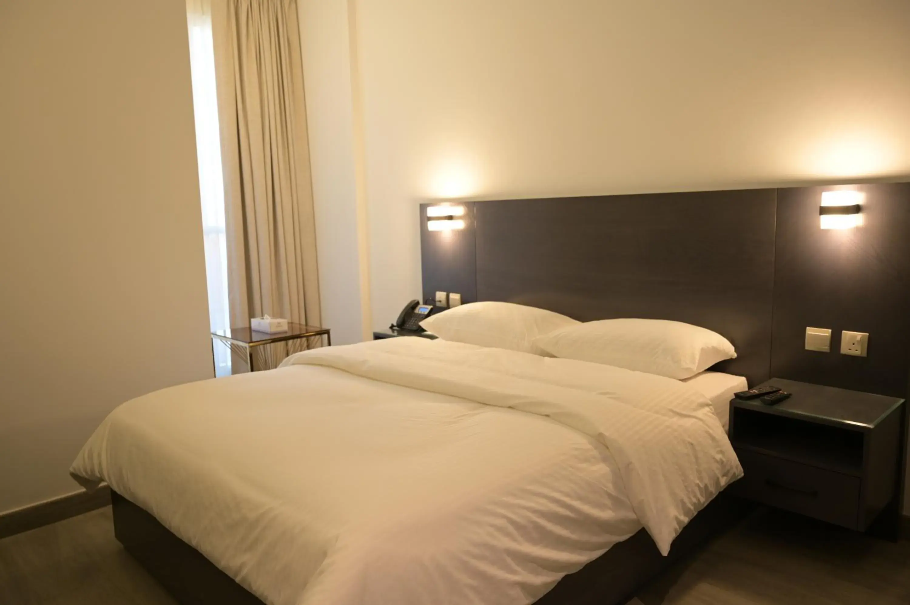 Bed in Garden City Hotel Dubai
