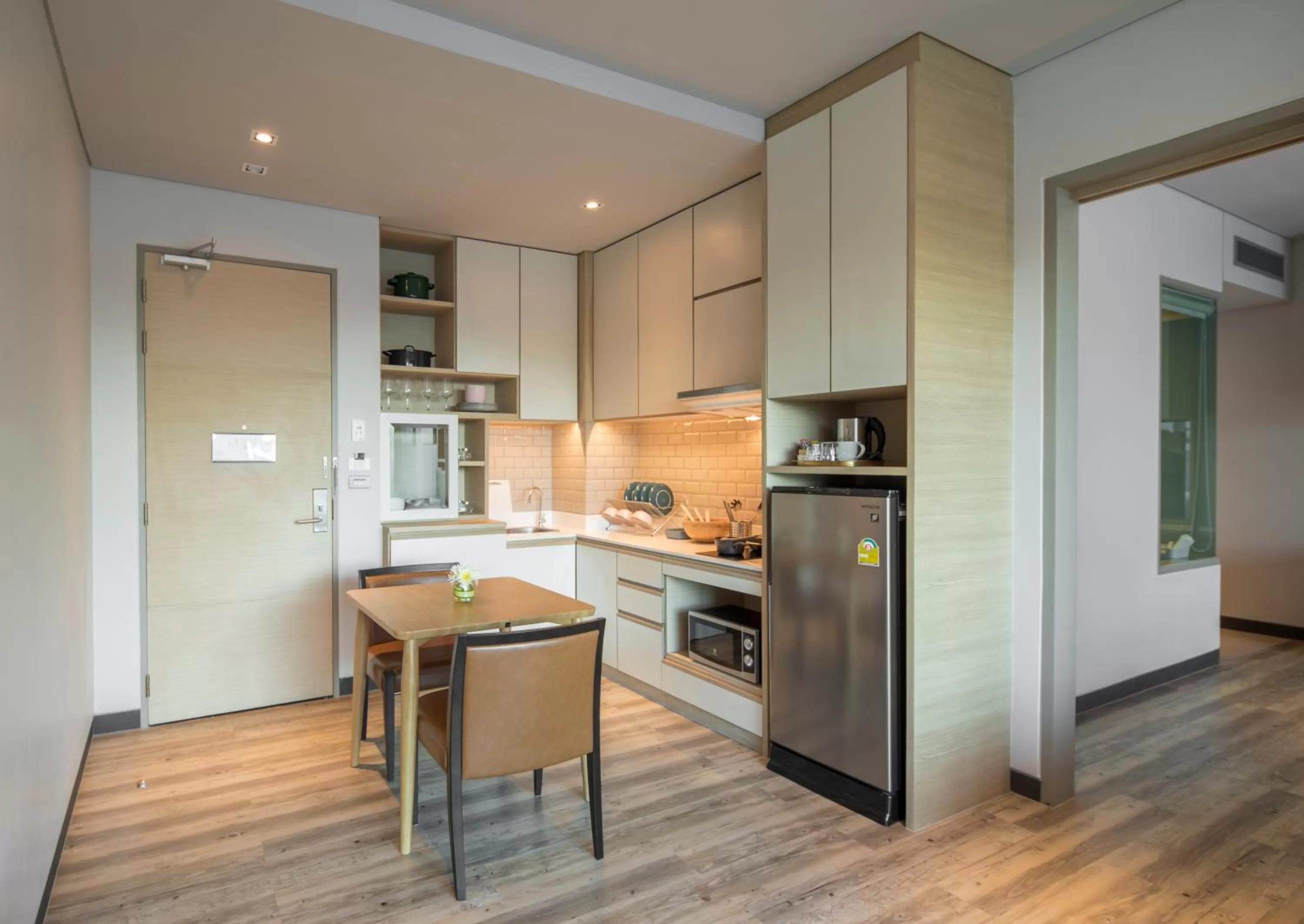 Kitchen or kitchenette in AisanA Hotel Korat