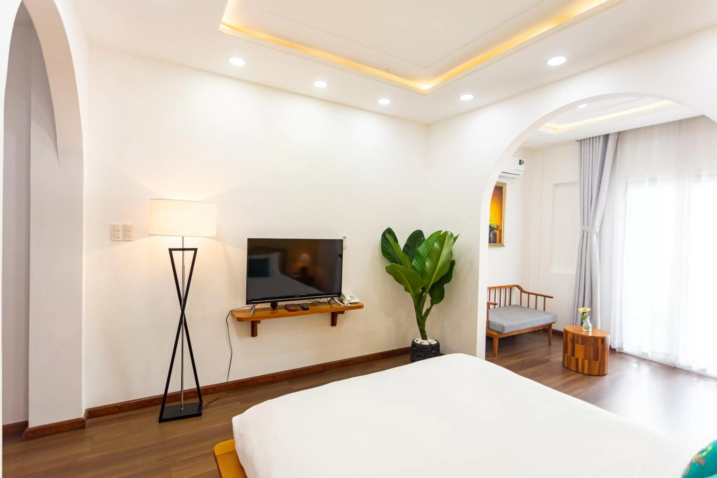 TV and multimedia, Bed in Chez Mimosa Local