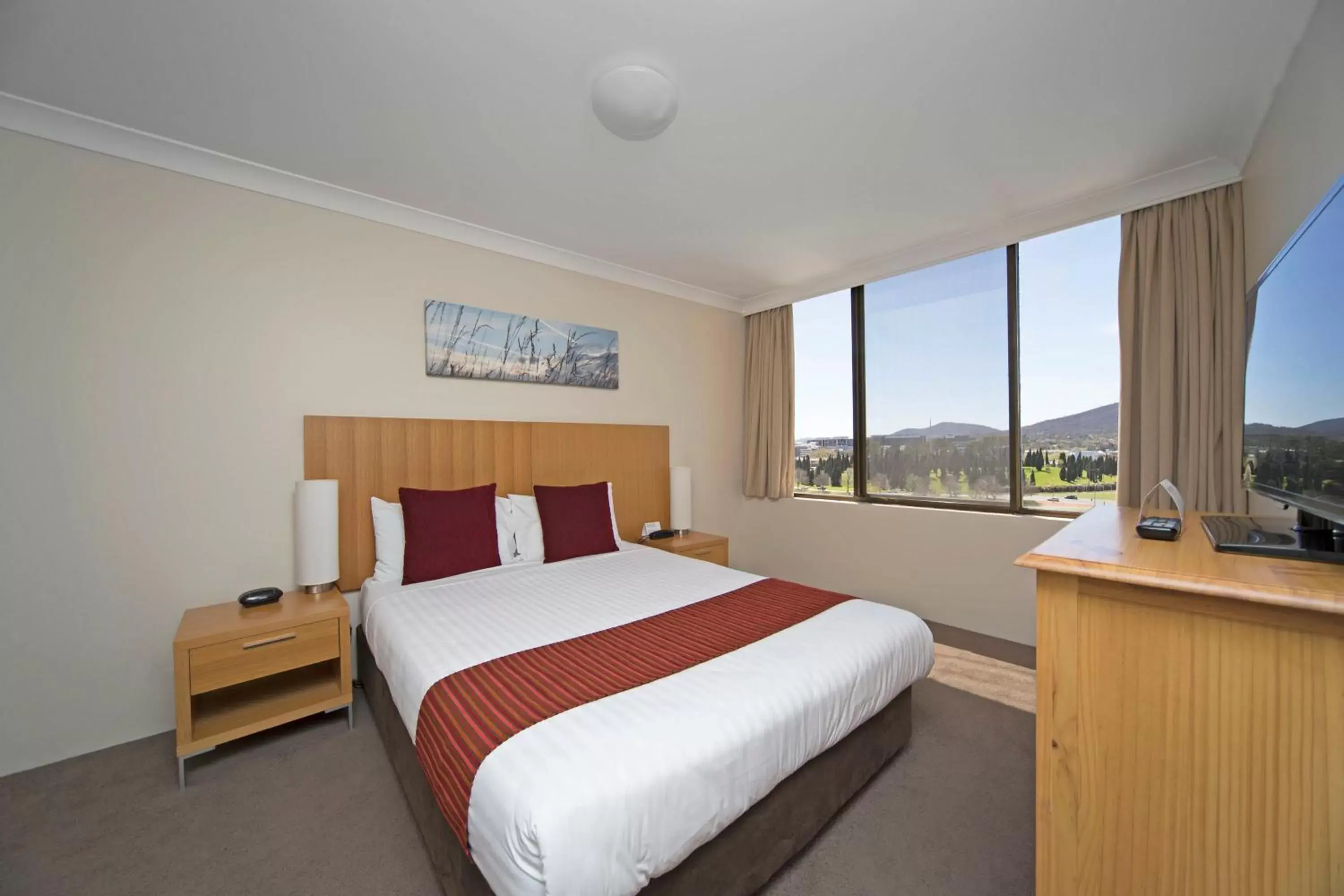 Bedroom, Bed in BreakFree Capital Tower Apartments