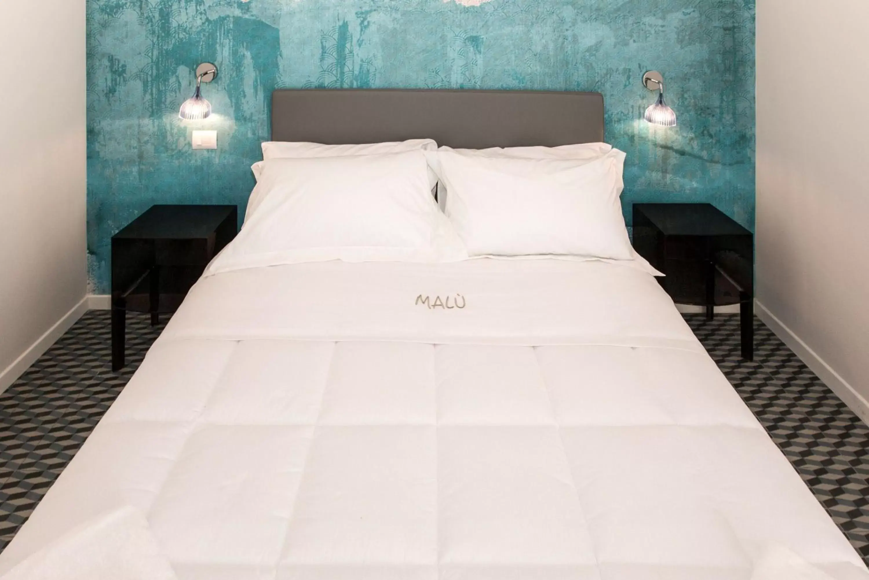 Bed in Malù Suites