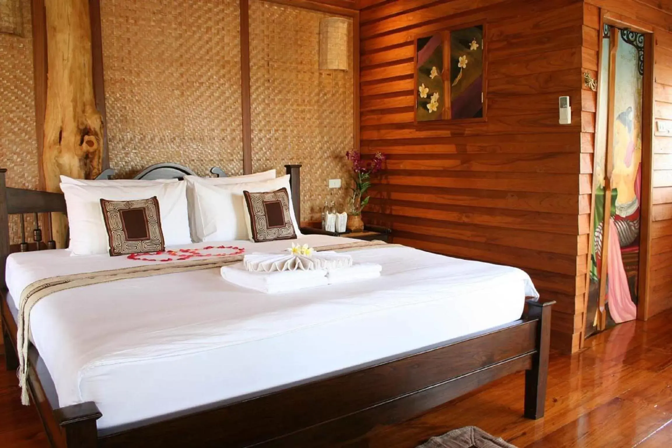 Bed in Pai Vimaan Resort