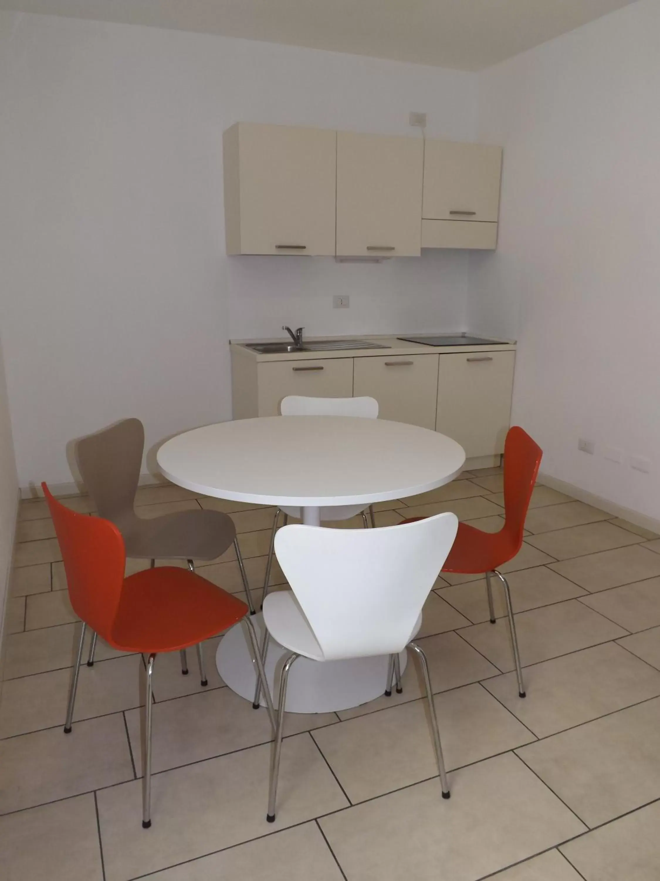 Kitchen or kitchenette, Dining Area in BB Hotels Aparthotel Visconti
