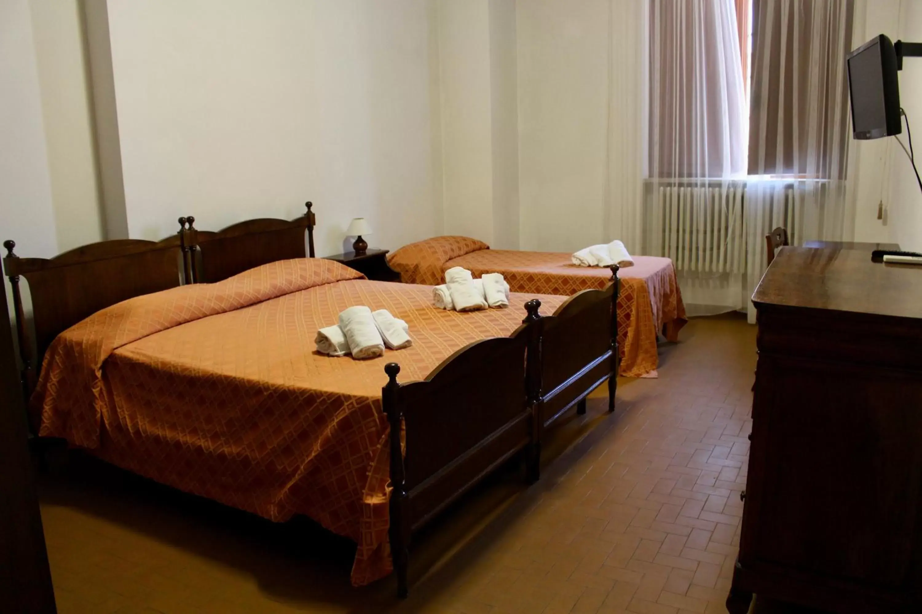 Photo of the whole room, Bed in Monastero SS. Annunziata
