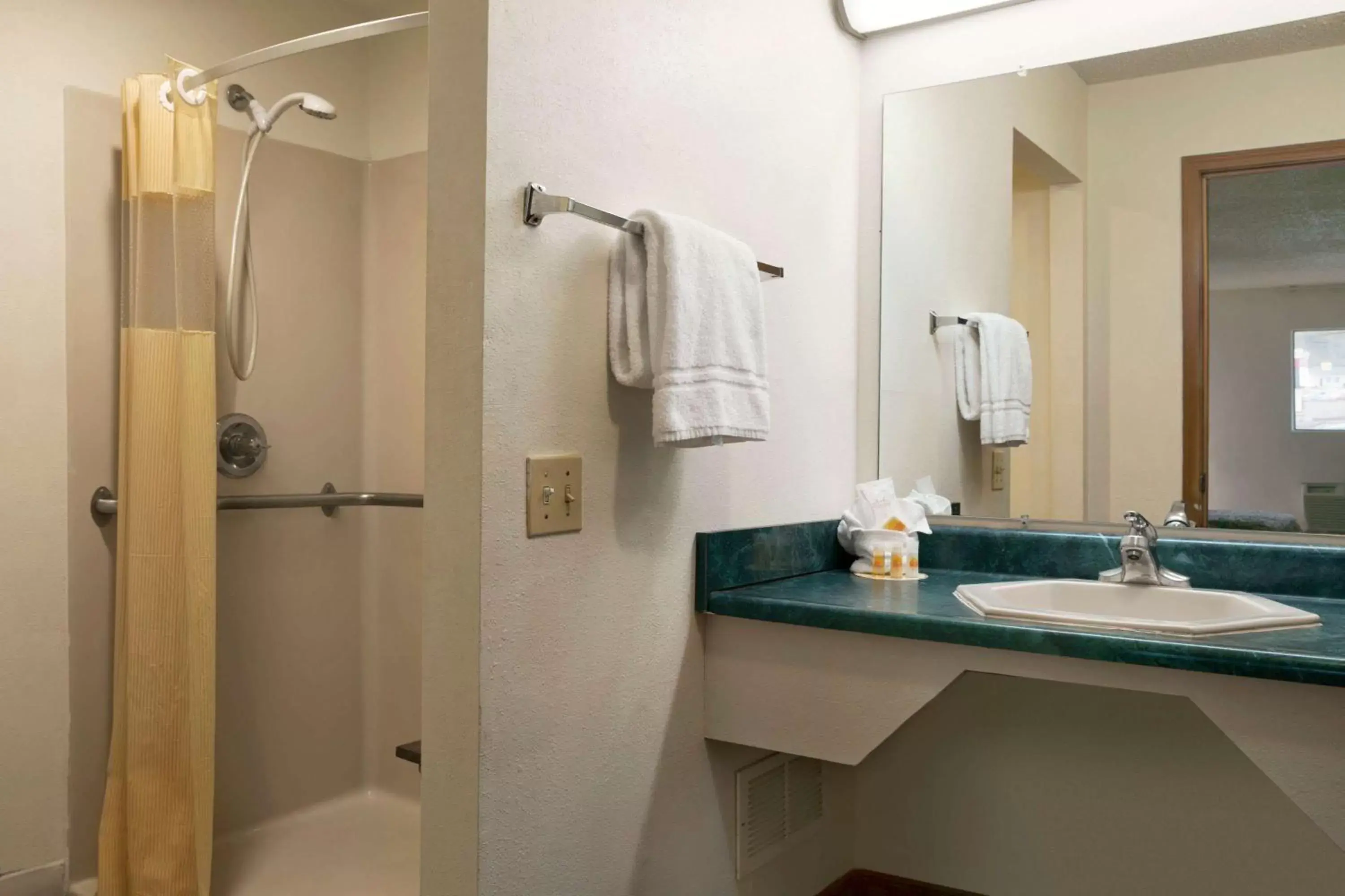 Bathroom in Days Inn by Wyndham Huntington