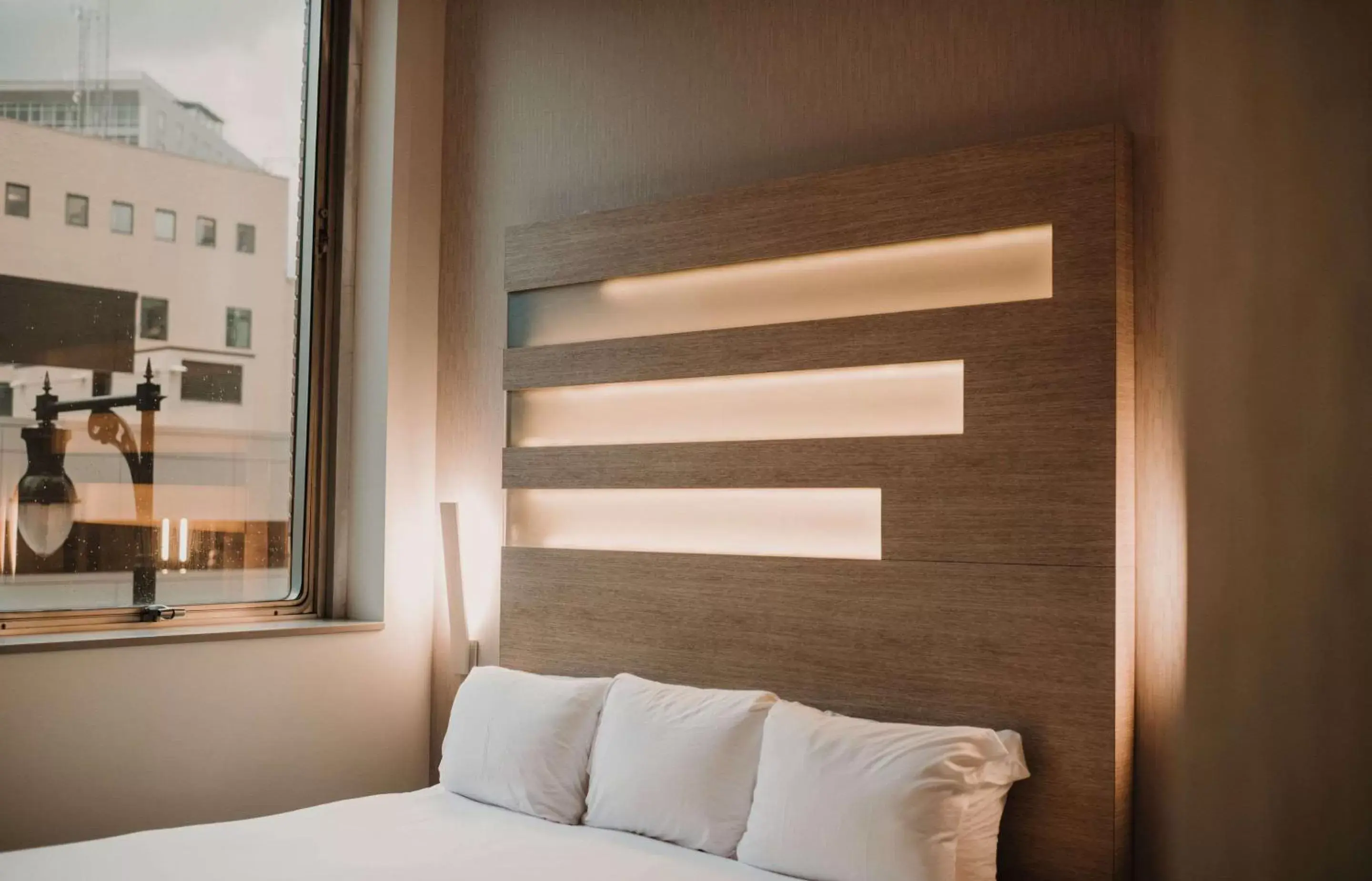 Bedroom, Bed in CityFlatsHotel - Grand Rapids, Ascend Hotel Collection