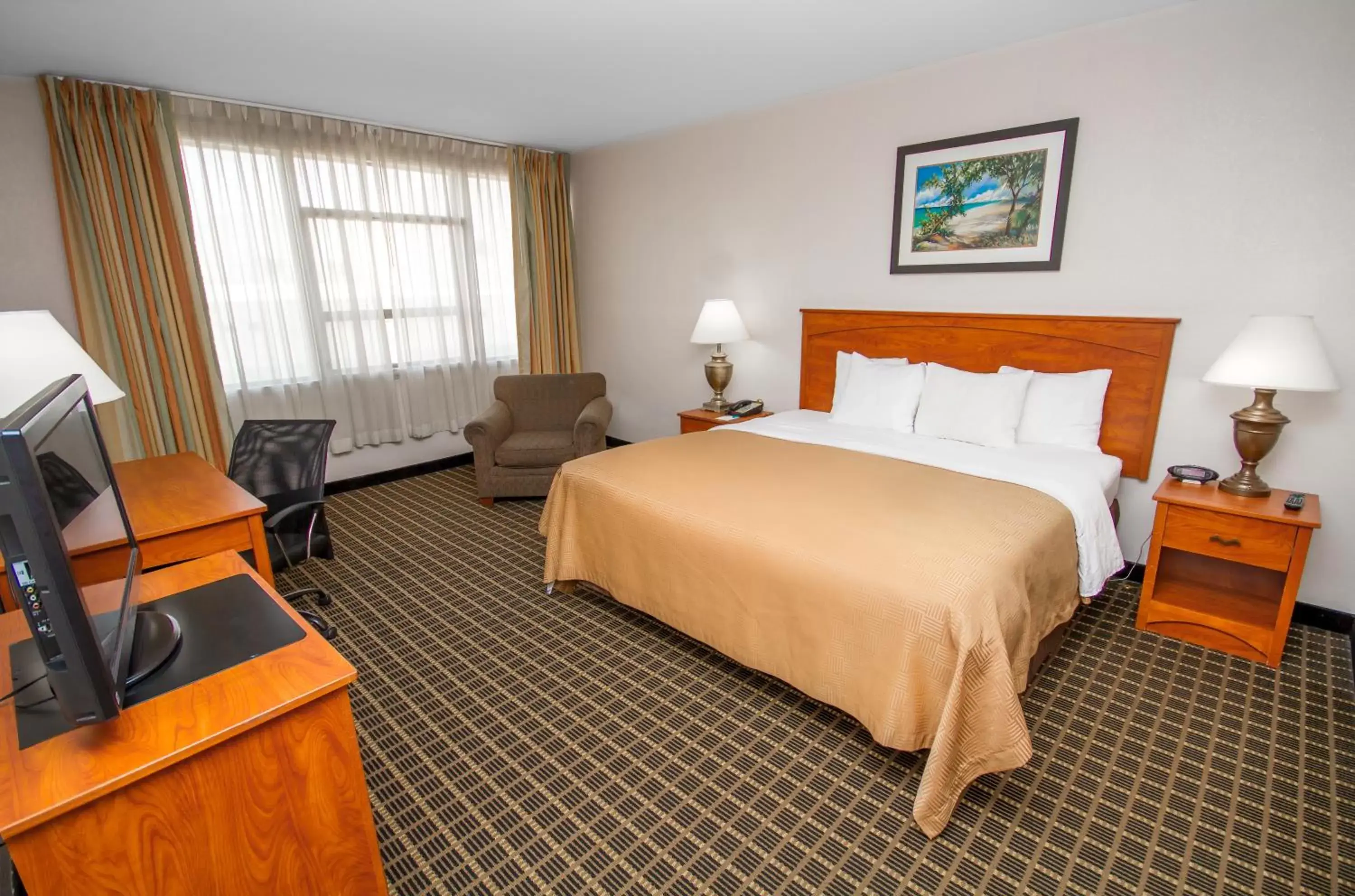 Bed in Clarion Inn & Suites Miami International Airport