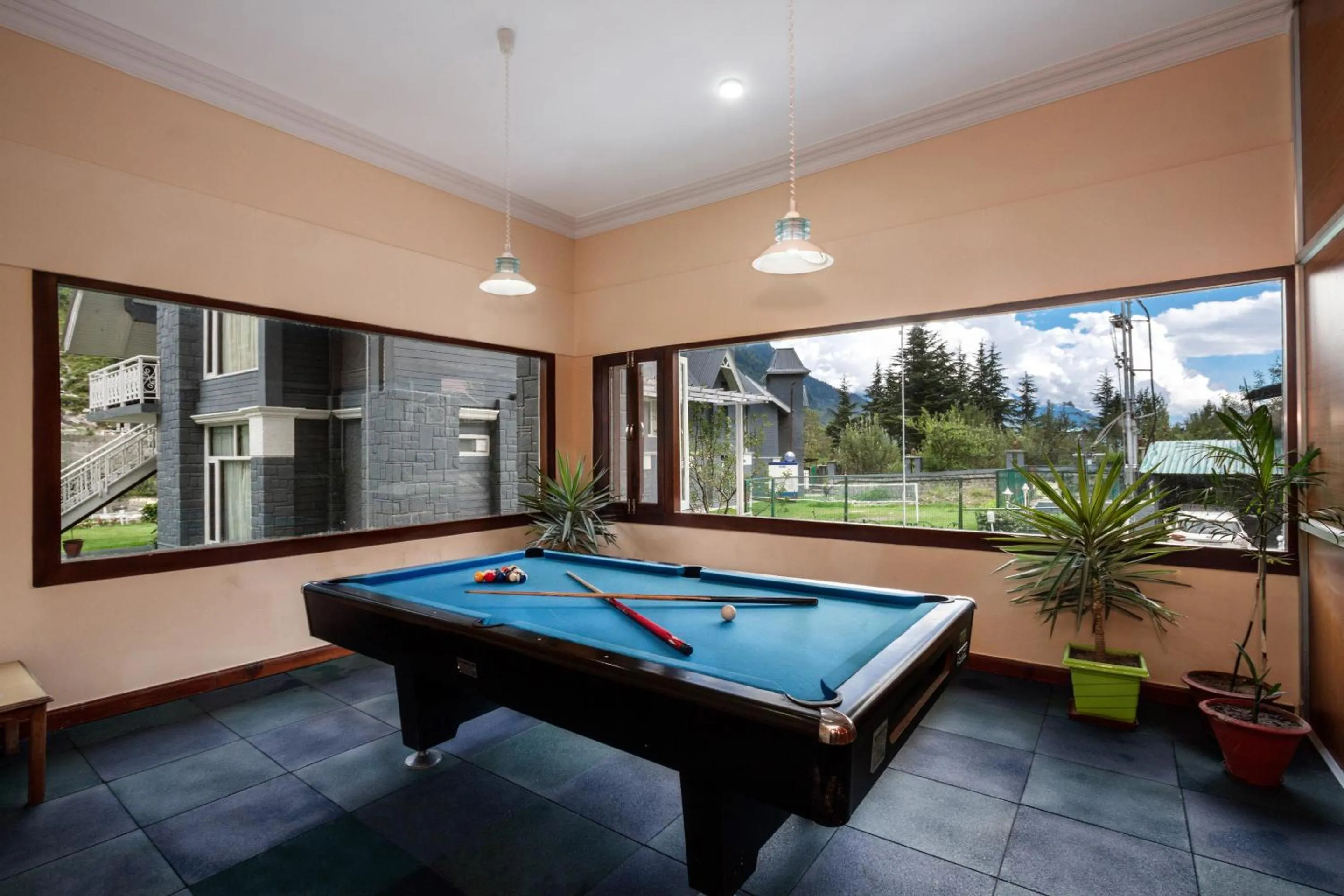 Game Room in The Highland Park - A Truly River side Resort