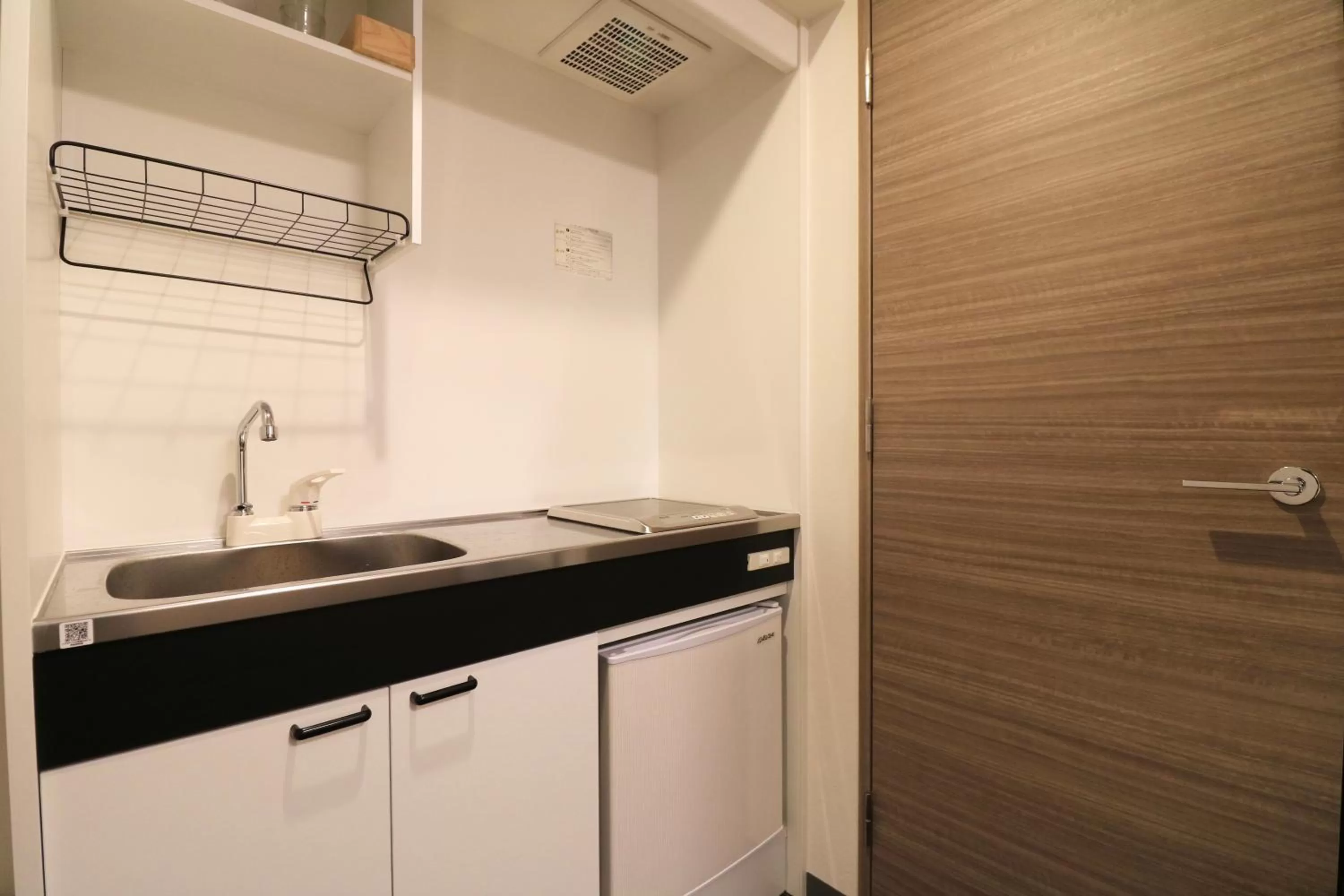 Kitchen or kitchenette in TAKETO STAY PREMIERE SAPPORO Eki