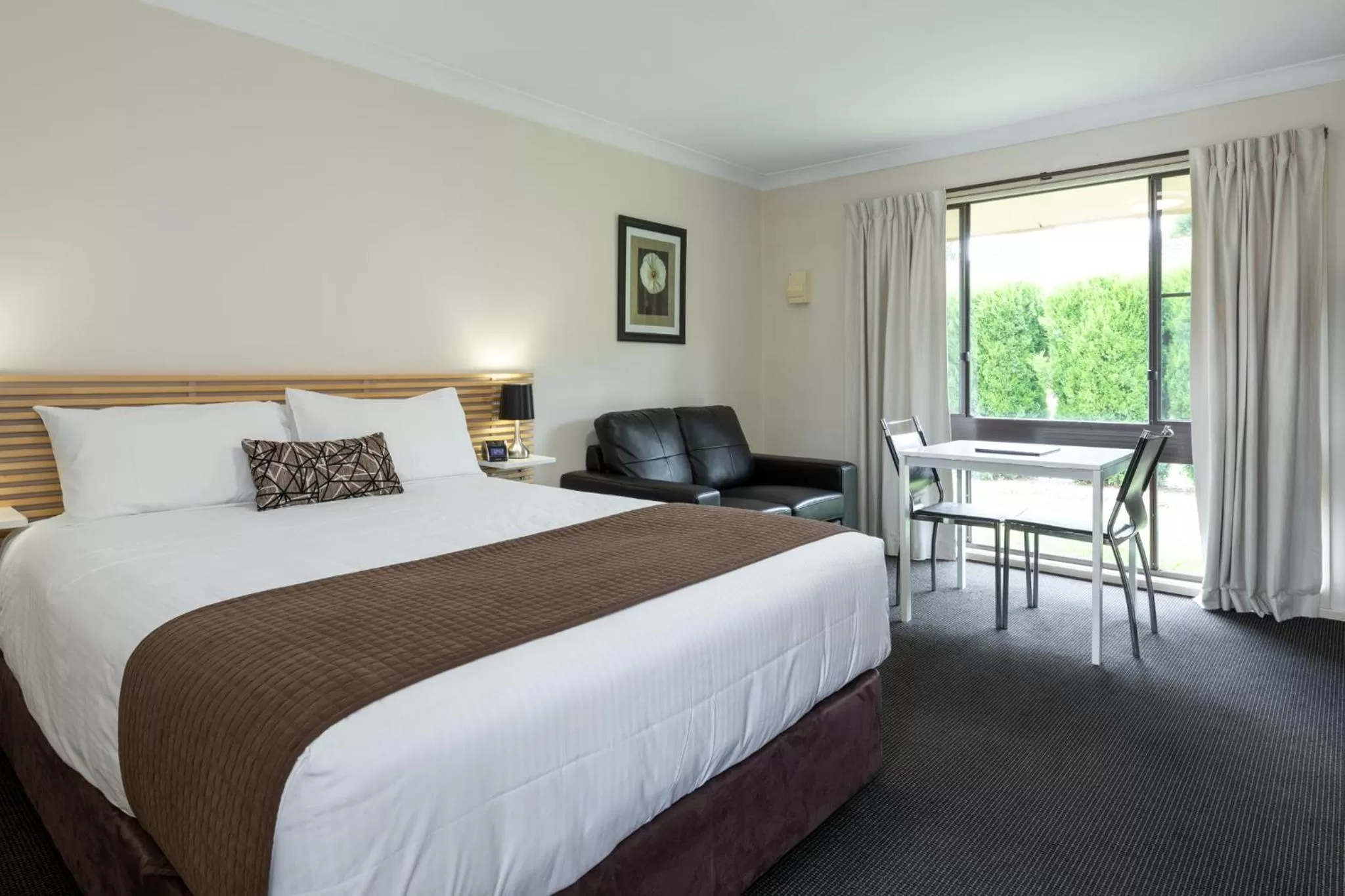 Bed in Zig Zag Motel & Apartments