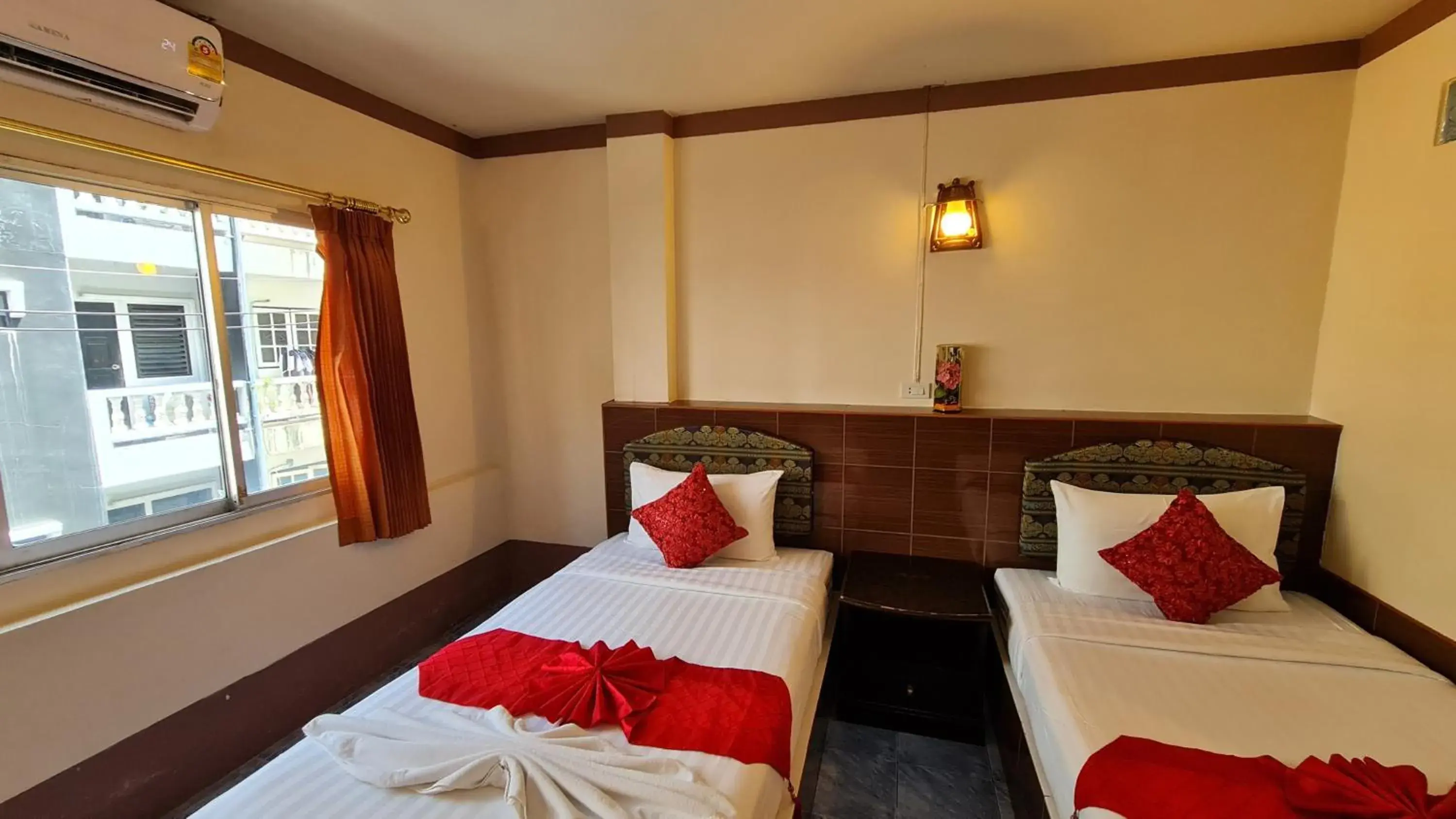 Bed in Vech Guesthouse Patong Bed in Vech Guesthouse Patong