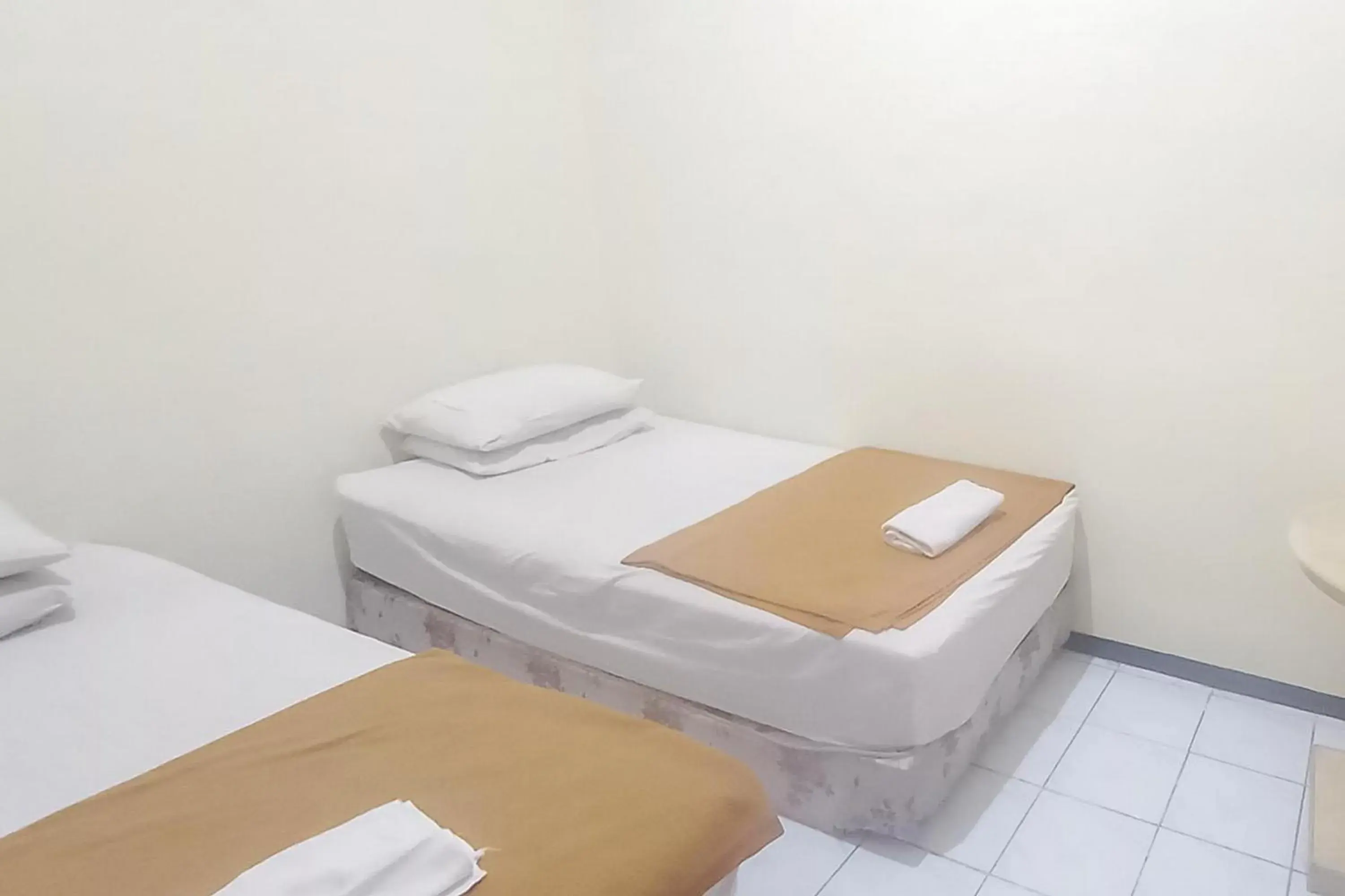 Bed in Hotel Malang near Alun Alun Malang RedPartner