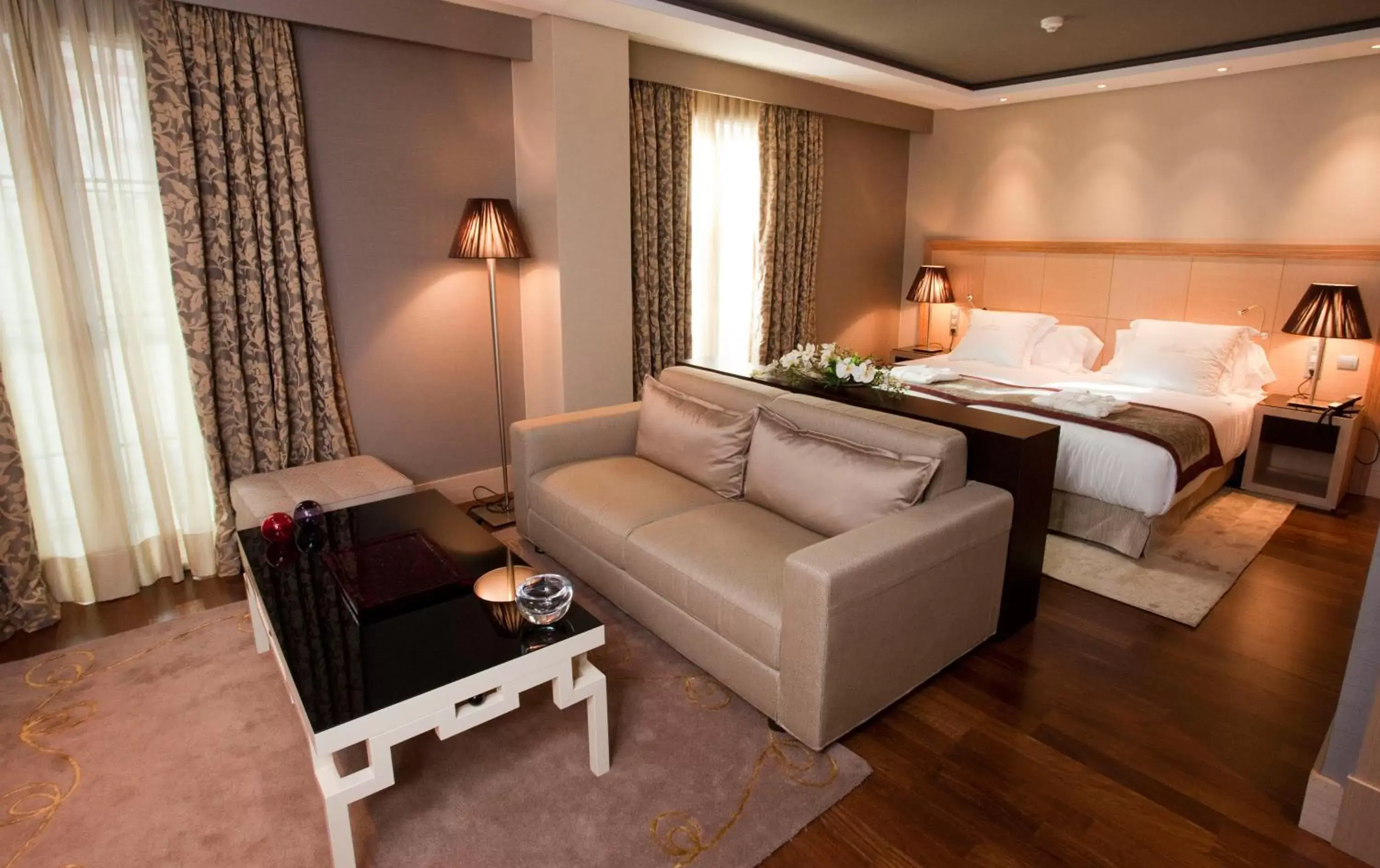 Photo of the whole room, Bed in Nexus Valladolid Suites & Hotel Photo of the whole room, Bed in Nexus Valladolid Suites & Hotel