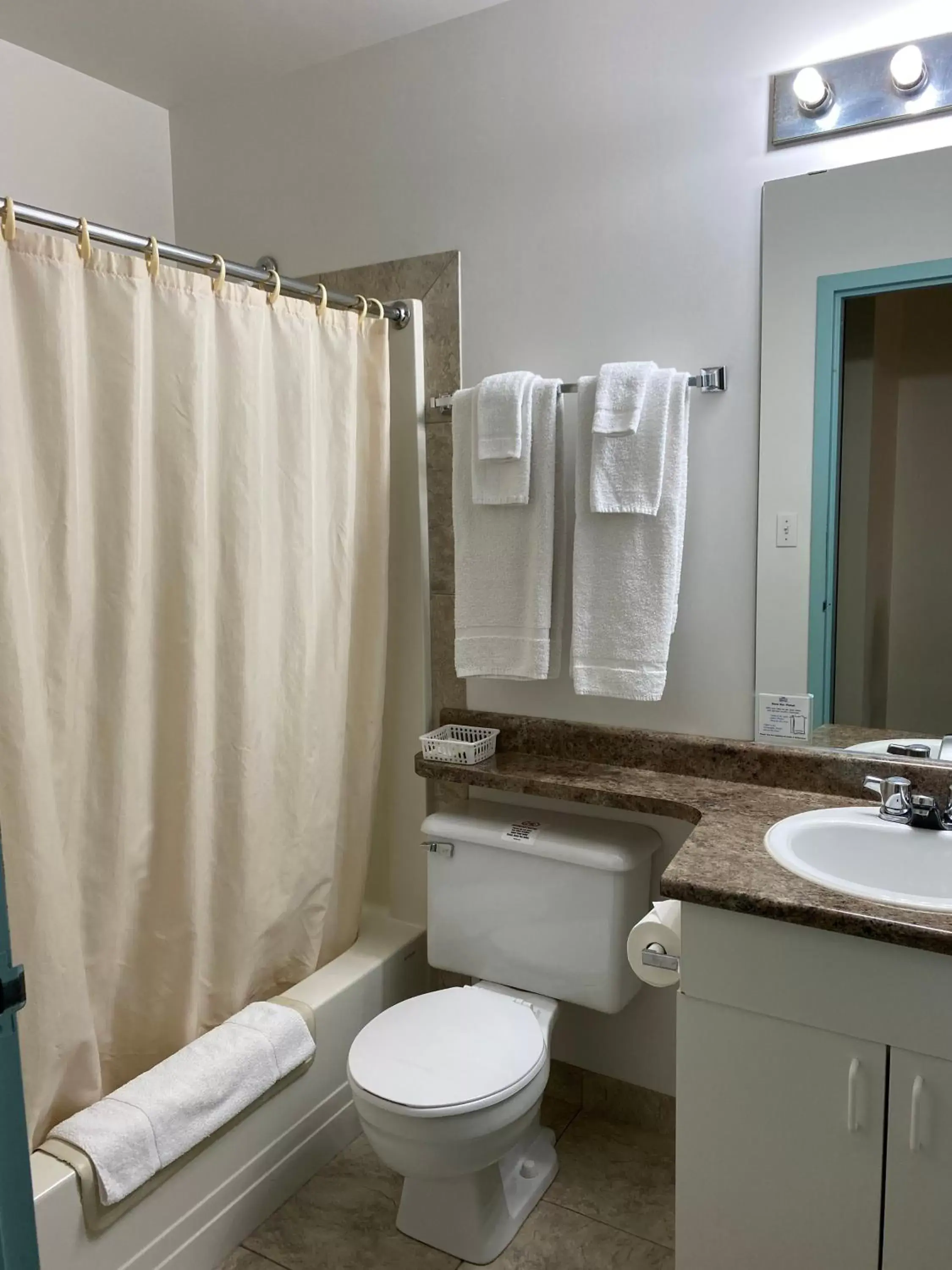 Shower, Bathroom in Sleep Suite Motel