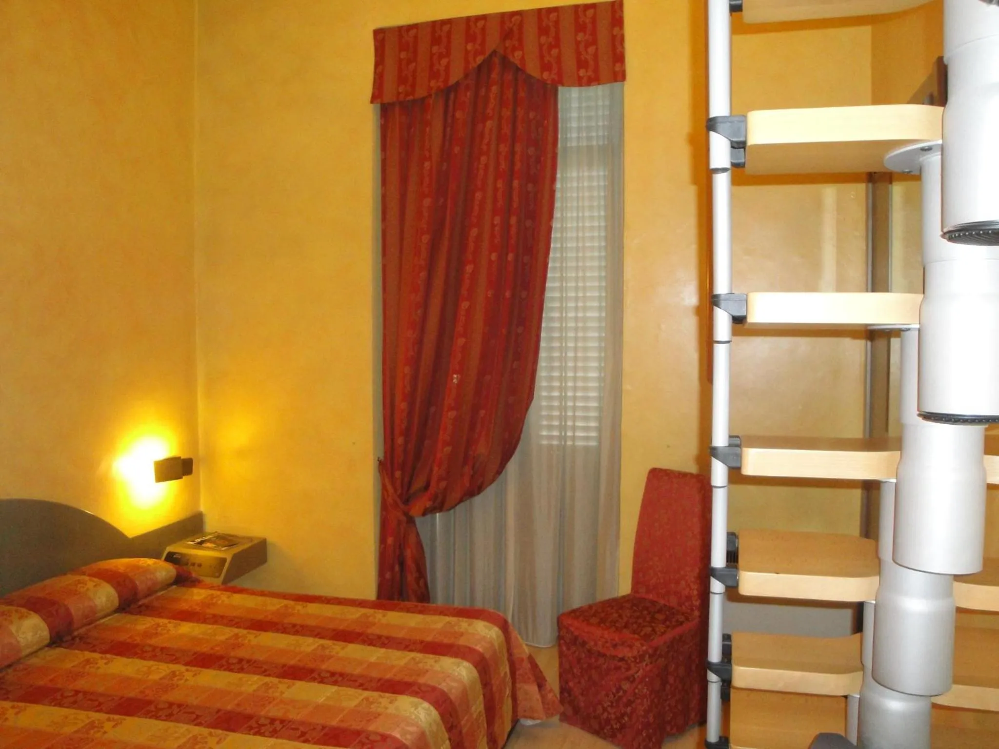 Bed in Hotel Due Mondi