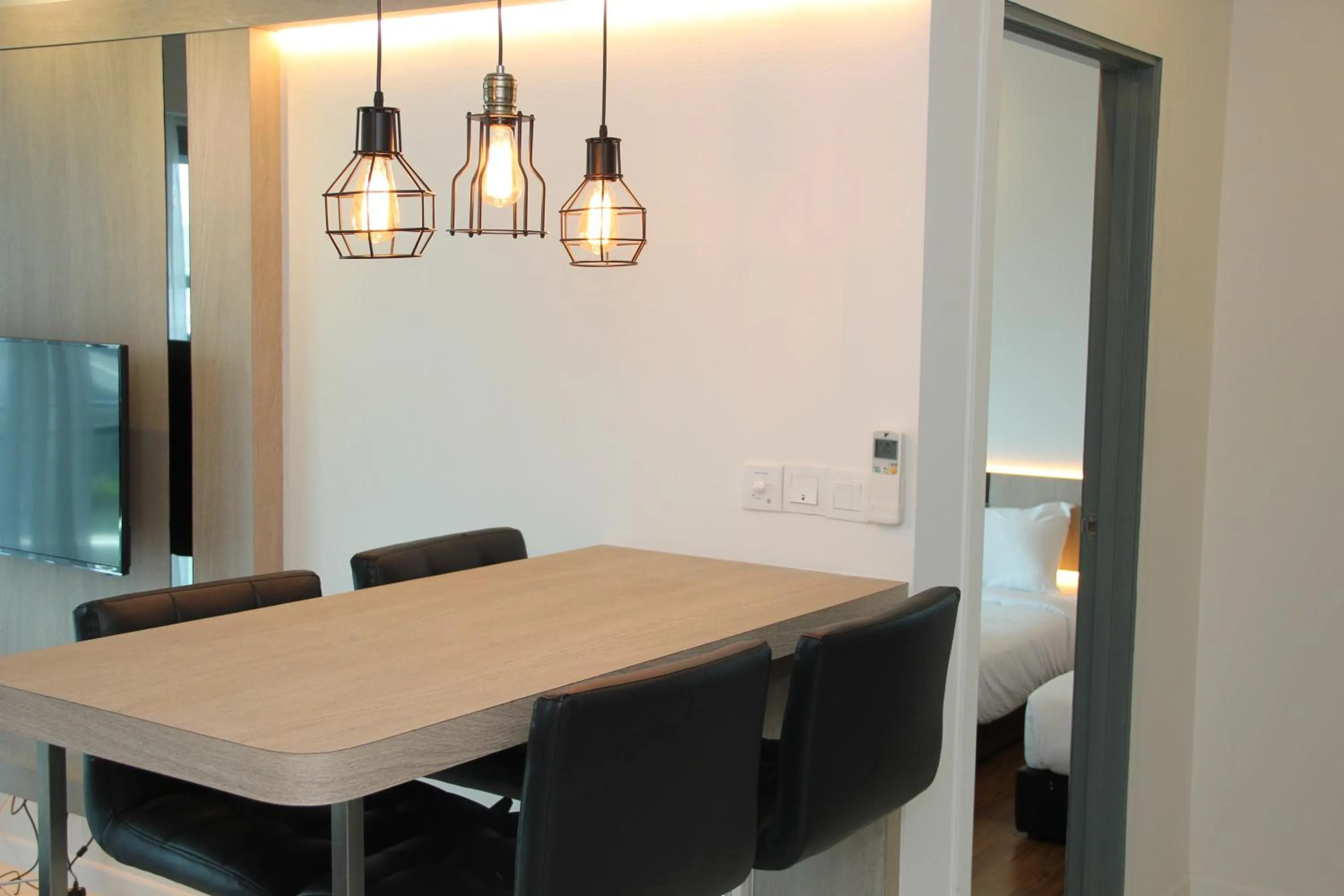 Dining area in Summer Suites Residences by Subhome