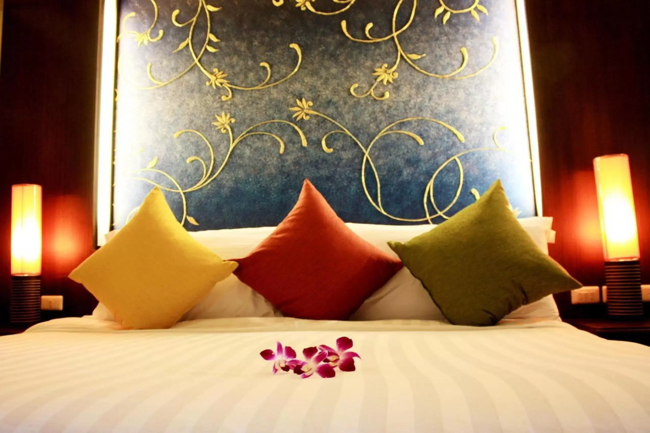 Bed in Khaolak Orchid Beach Resort - SHA Extra Plus