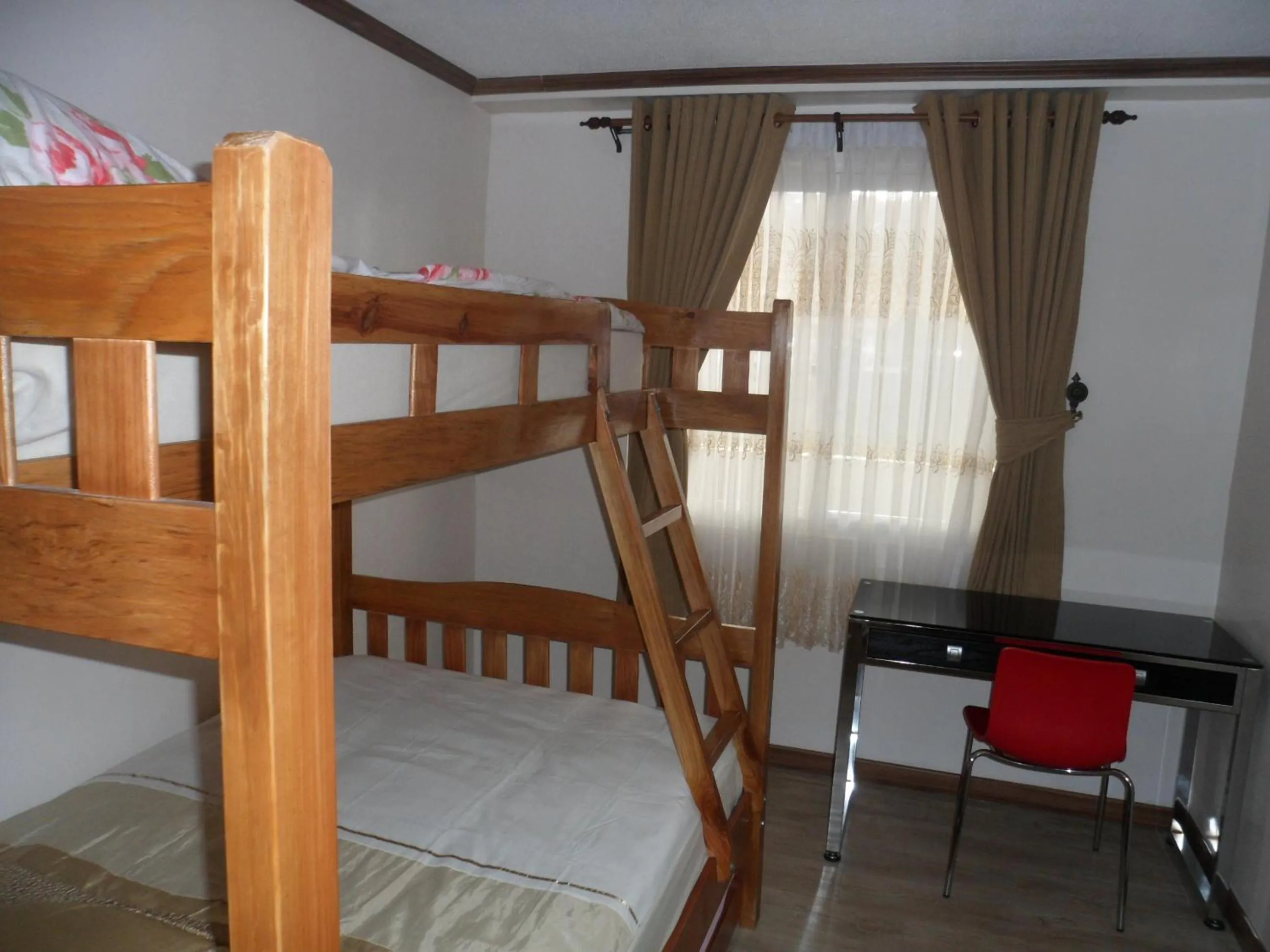 bunk bed, Bed in Prestige Vacation Apartments - Bonbel Condominium