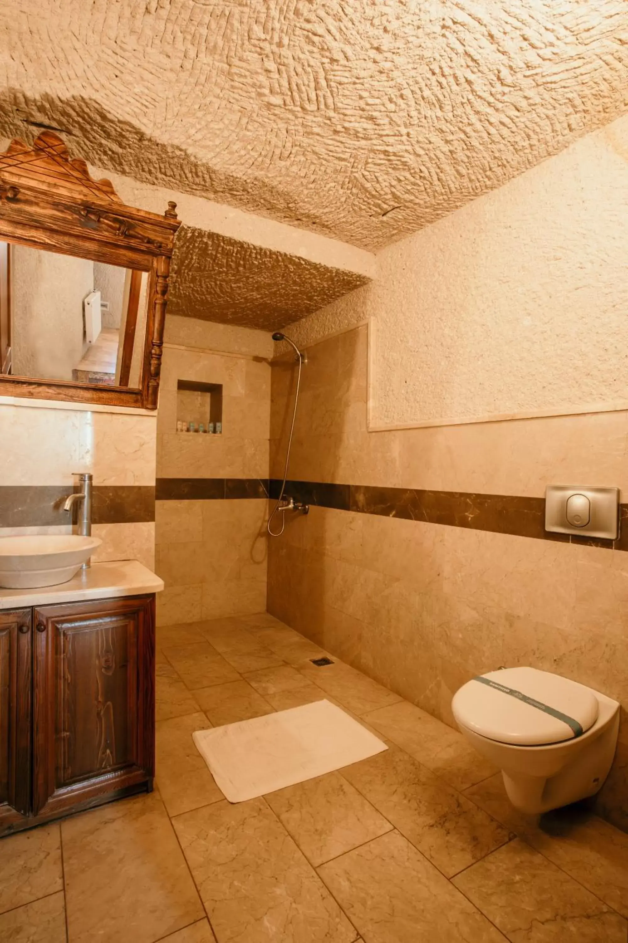 Shower, Bathroom in Village Cave House Hotel