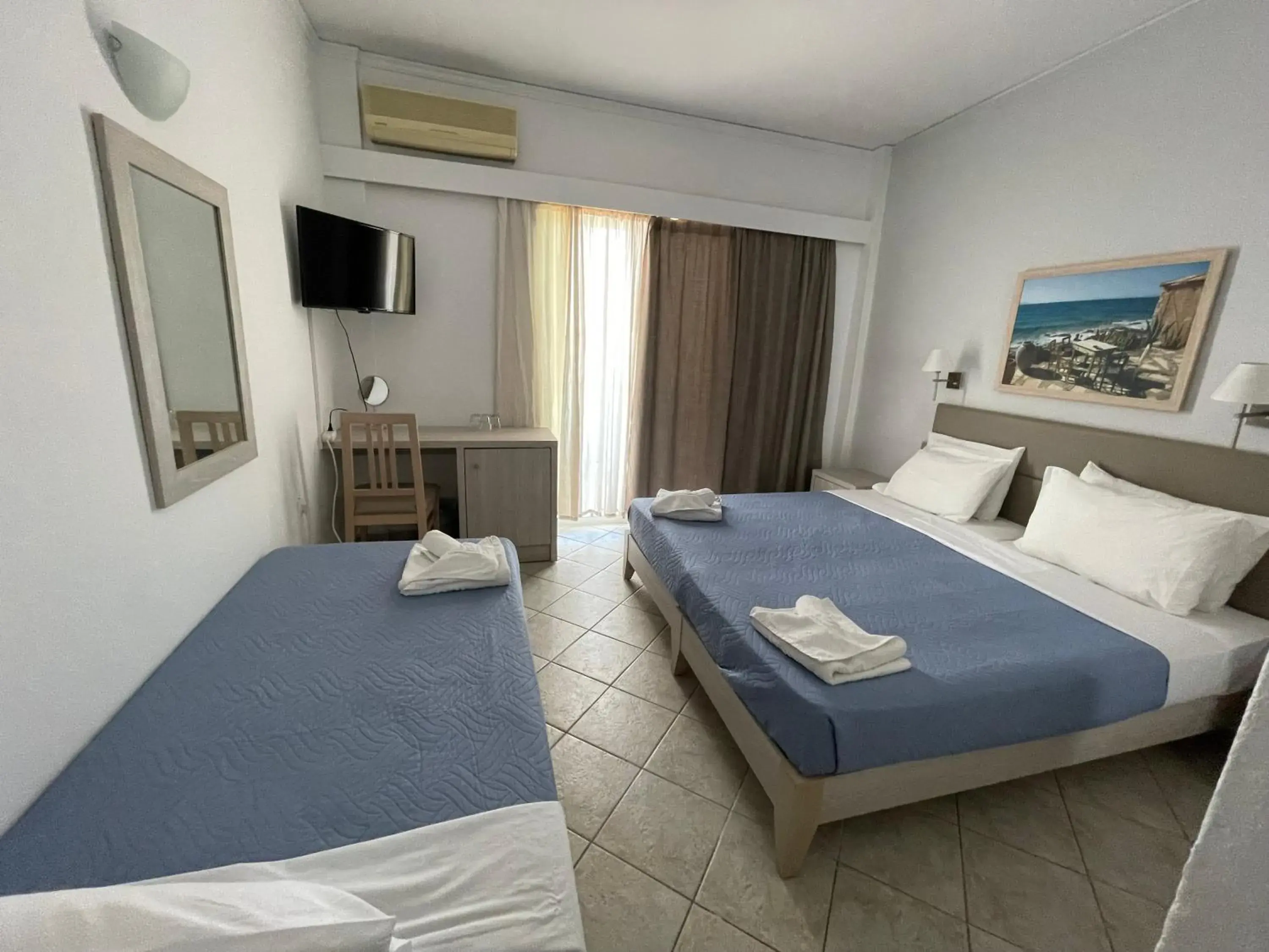 Bed in Aristea Hotel