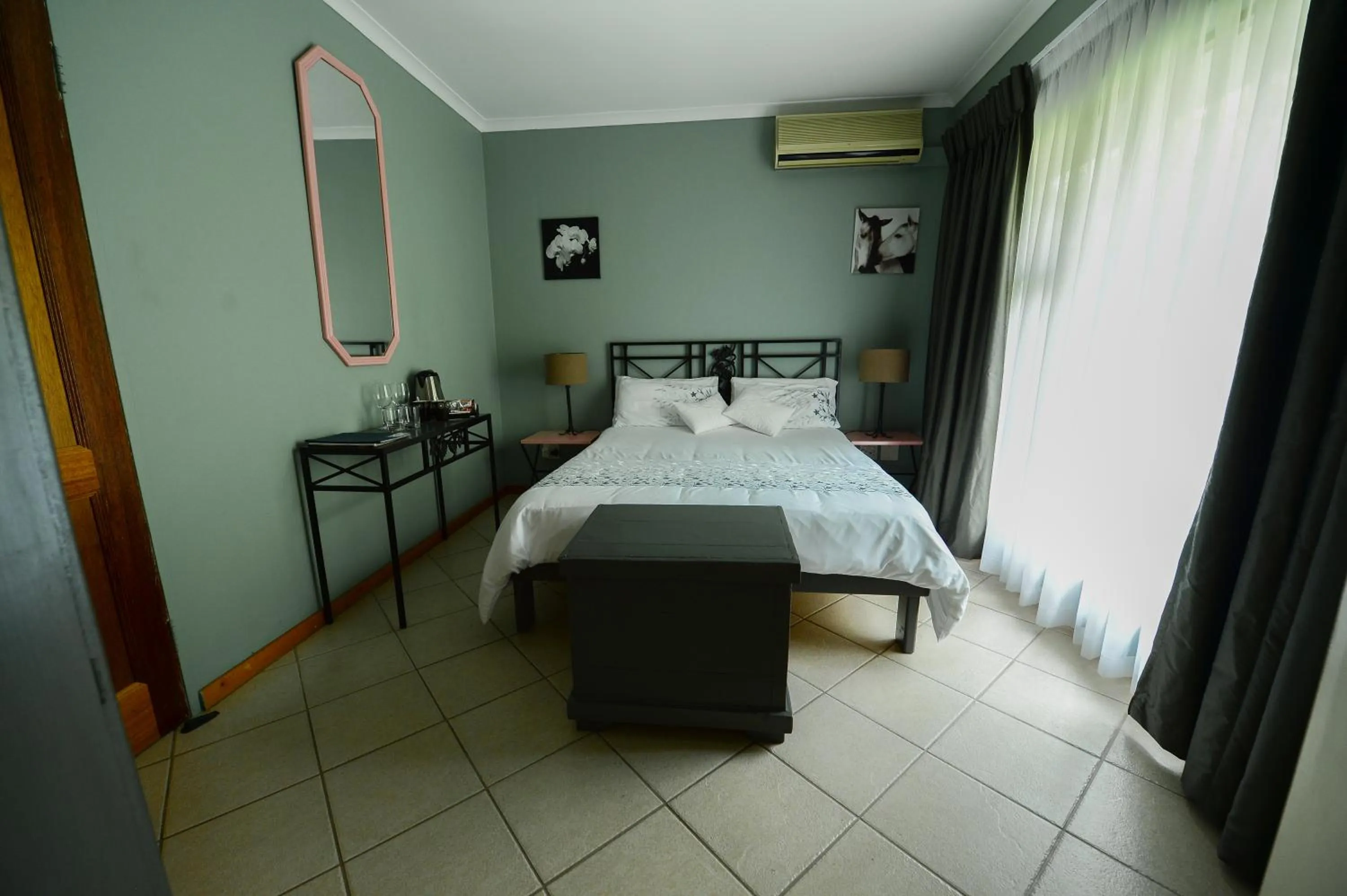 Bed in De Wingerd Wijnland Lodge