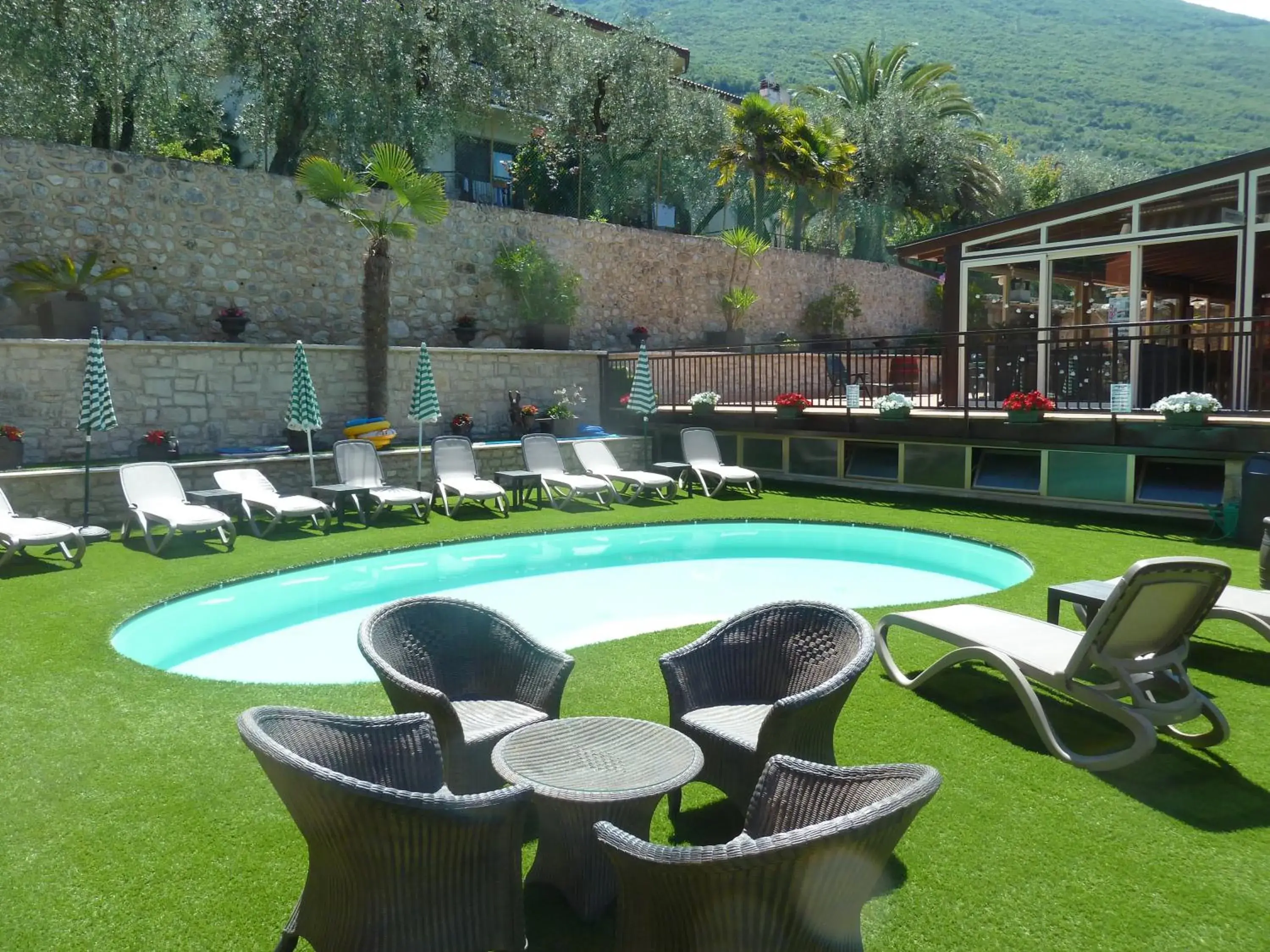Garden view, Swimming Pool in Albergo Casa Este
